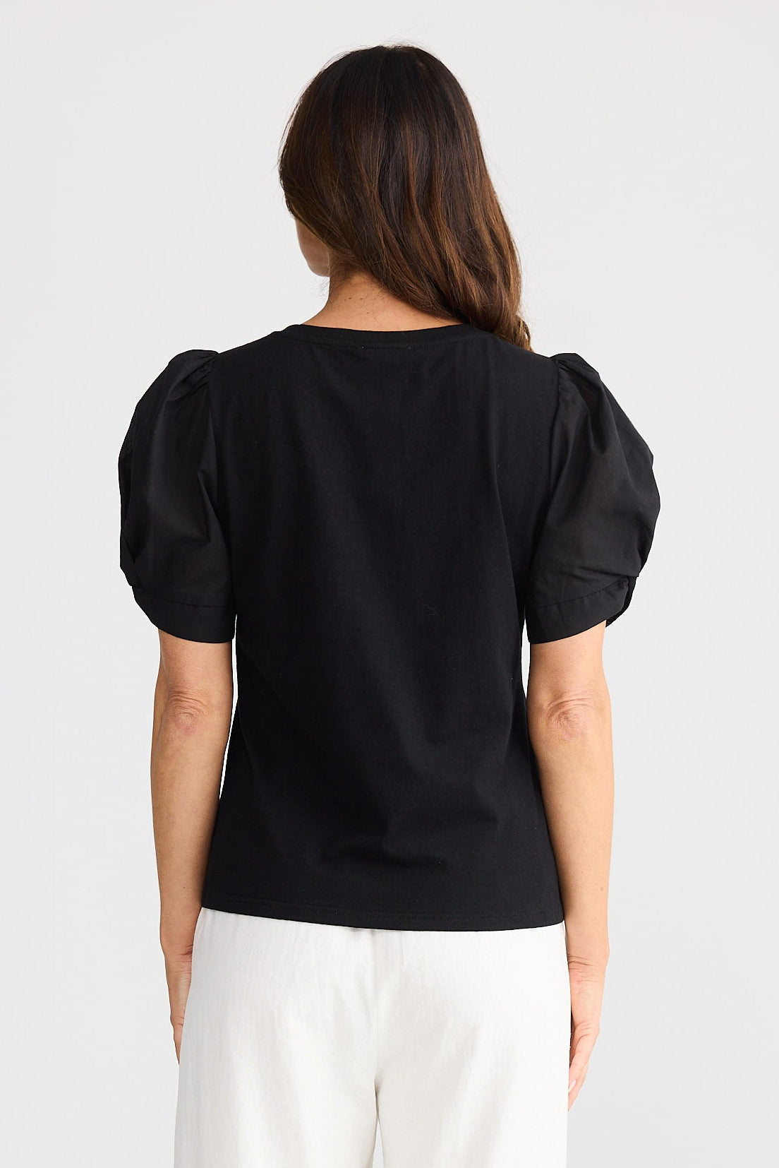 Back of black t-shirt with puff sleeves 