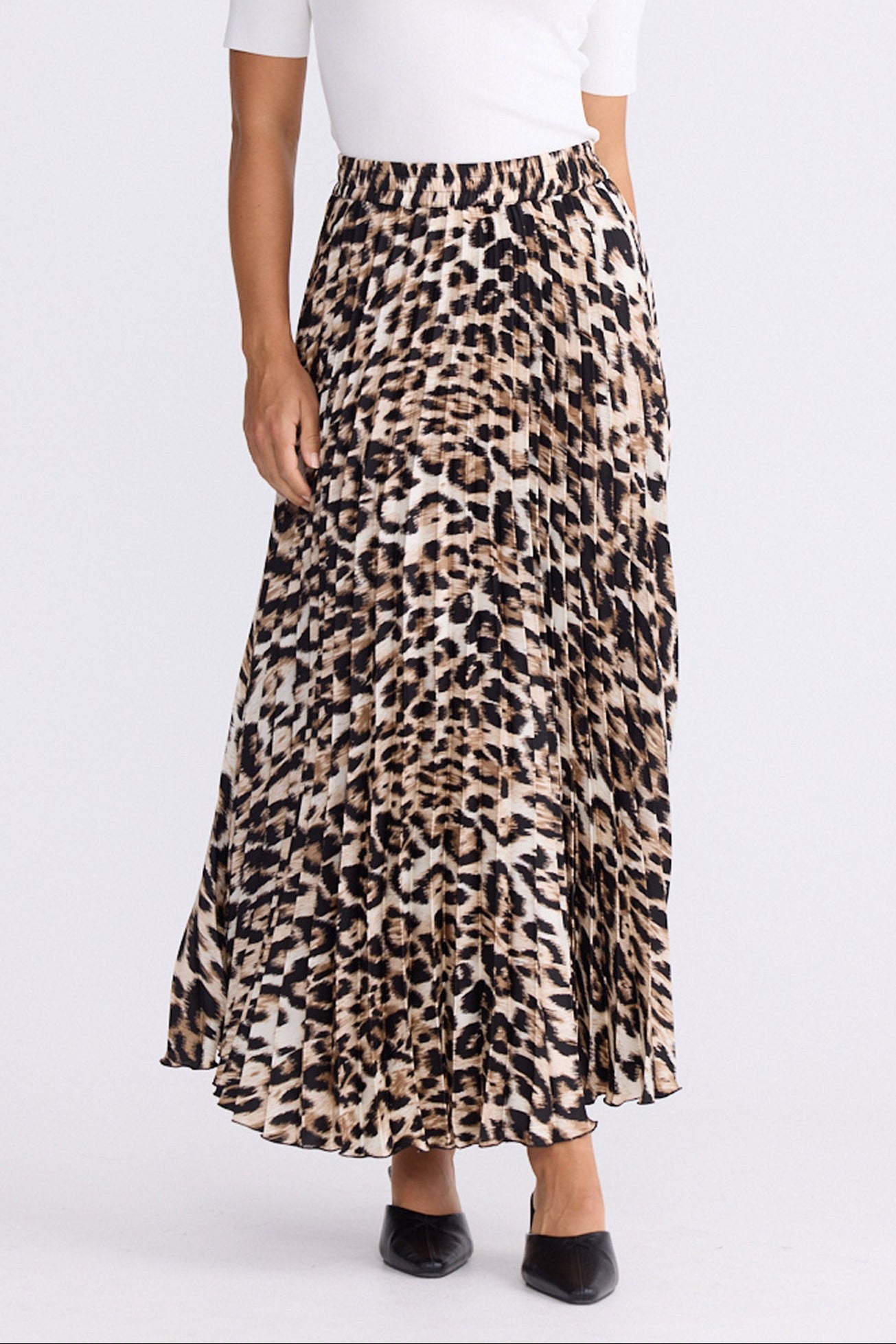 Model wearing Alias Pleated Skirt multicolour animal-print skirt with permanent pleated finish, front view on white background