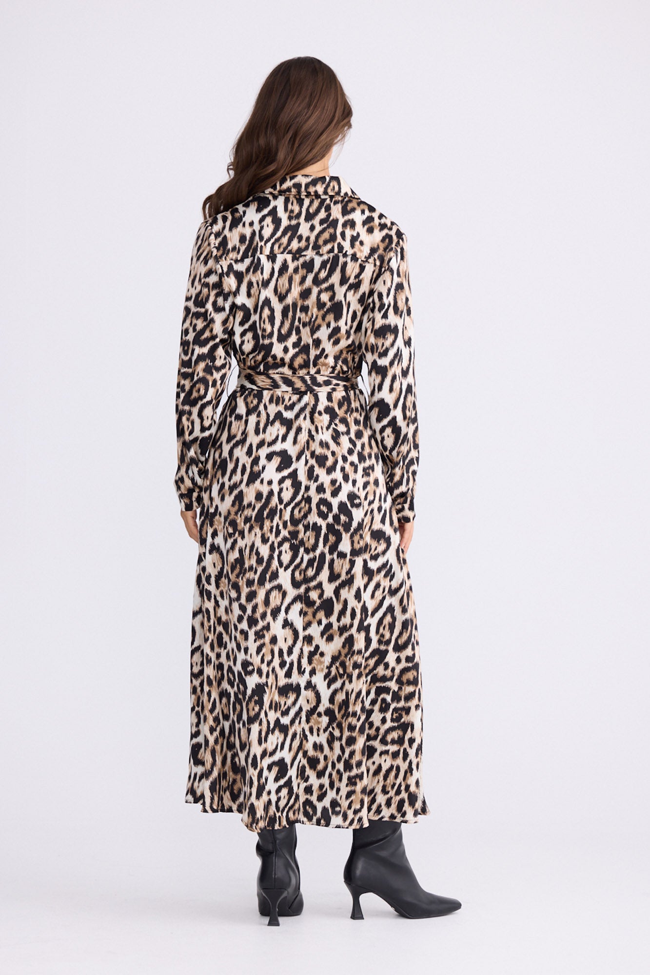 Model wearing Rossellini Long Sleeve Dress in savannah print with shirt collar, front view on white background