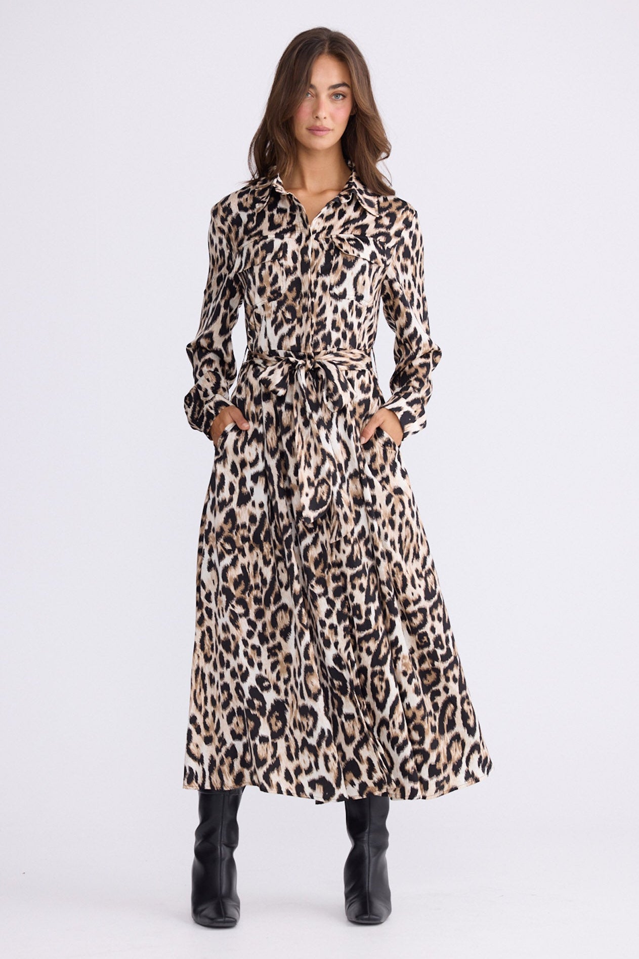 Model wearing Rossellini Long Sleeve Dress in savannah print with shirt collar, front view on white background