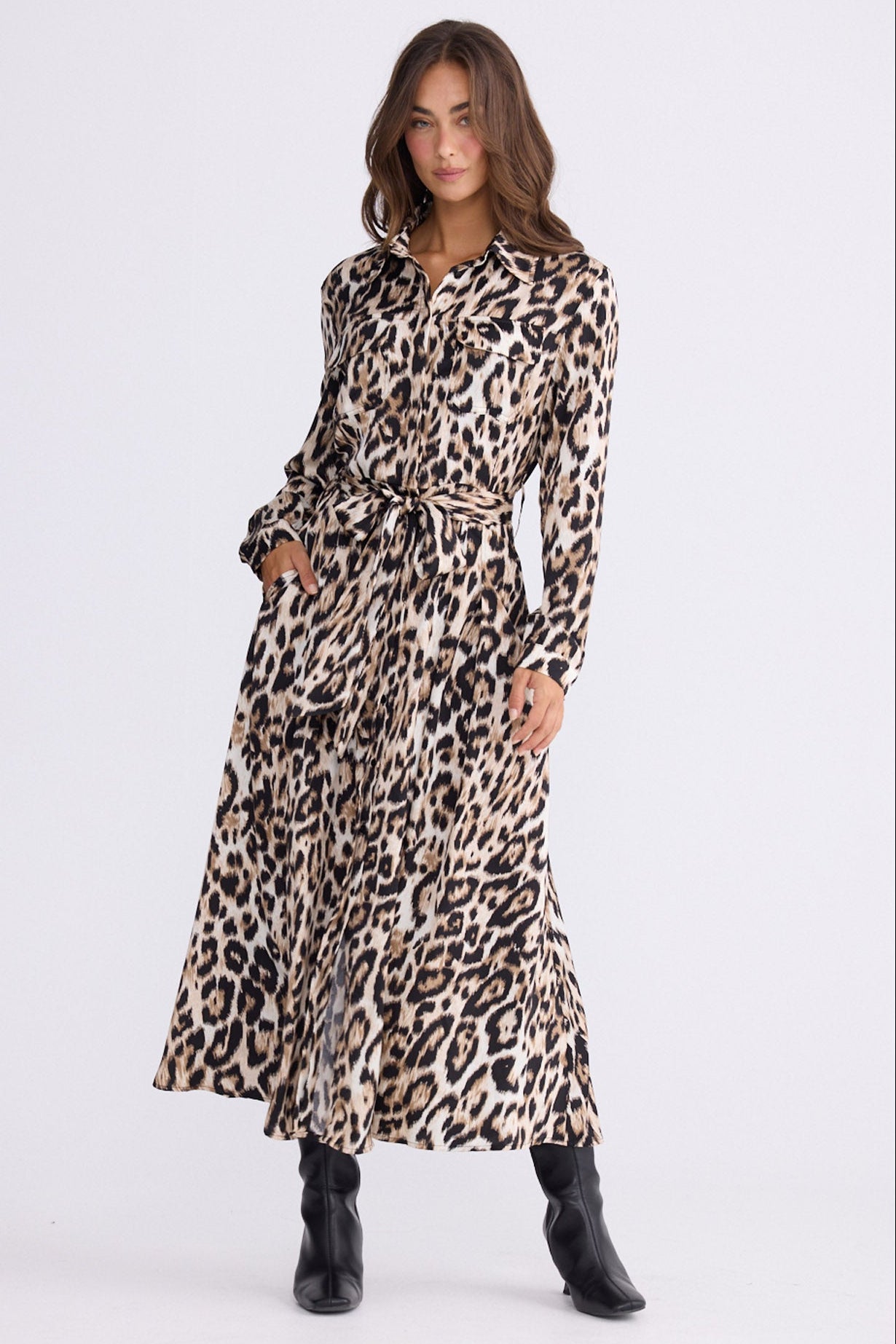 Model wearing Rossellini Long Sleeve Dress in savannah print with shirt collar, front view on white background