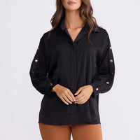 Model wearing Cassian Shirt - Black, alternate studio view on white background