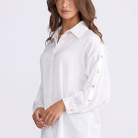 Model wearing Cassian Shirt - Ivory, alternate studio view on white background