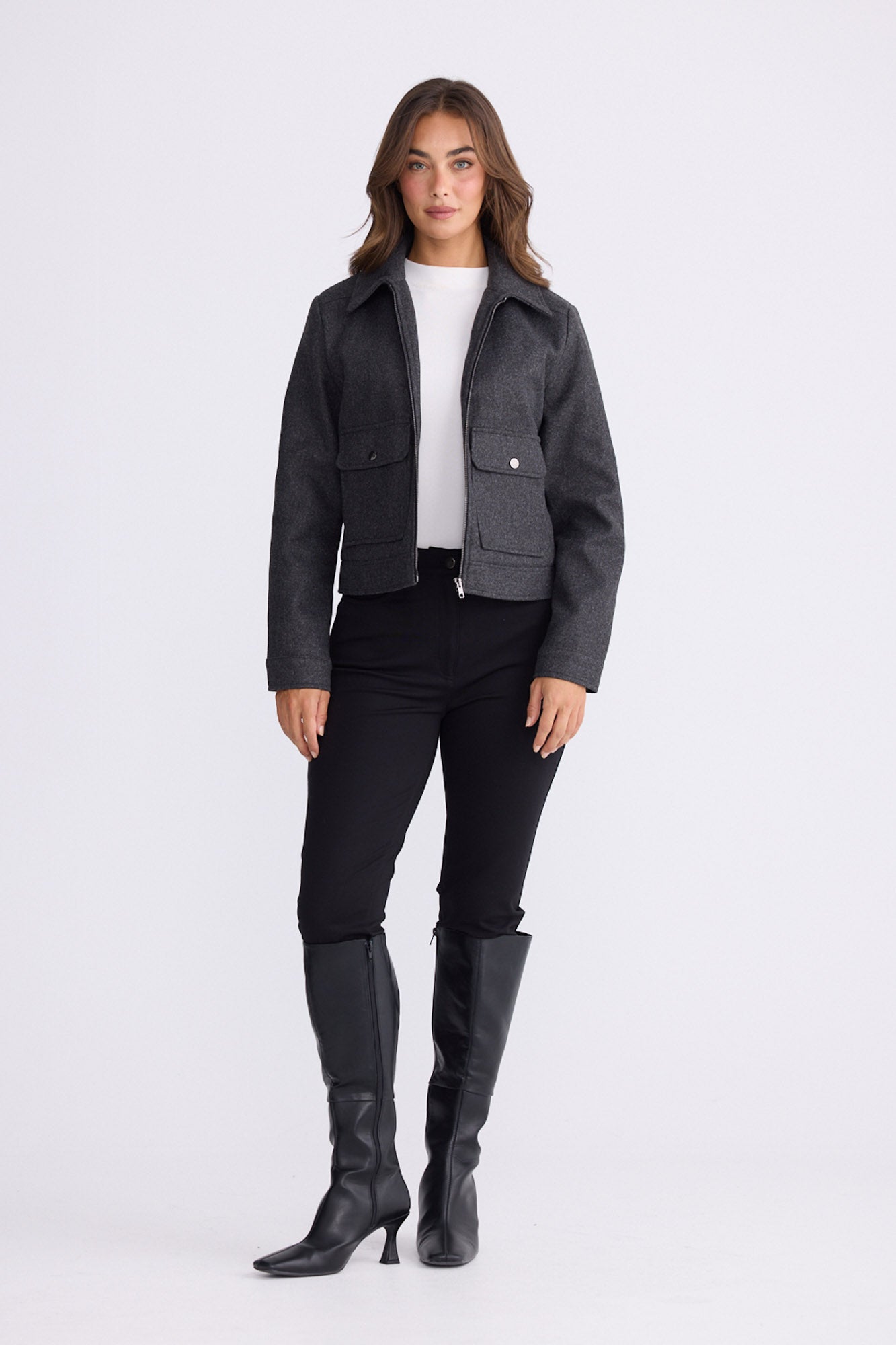 Model wearing Hollis Jacket grey jacket, front pockets with button detail, alternate studio view on white background