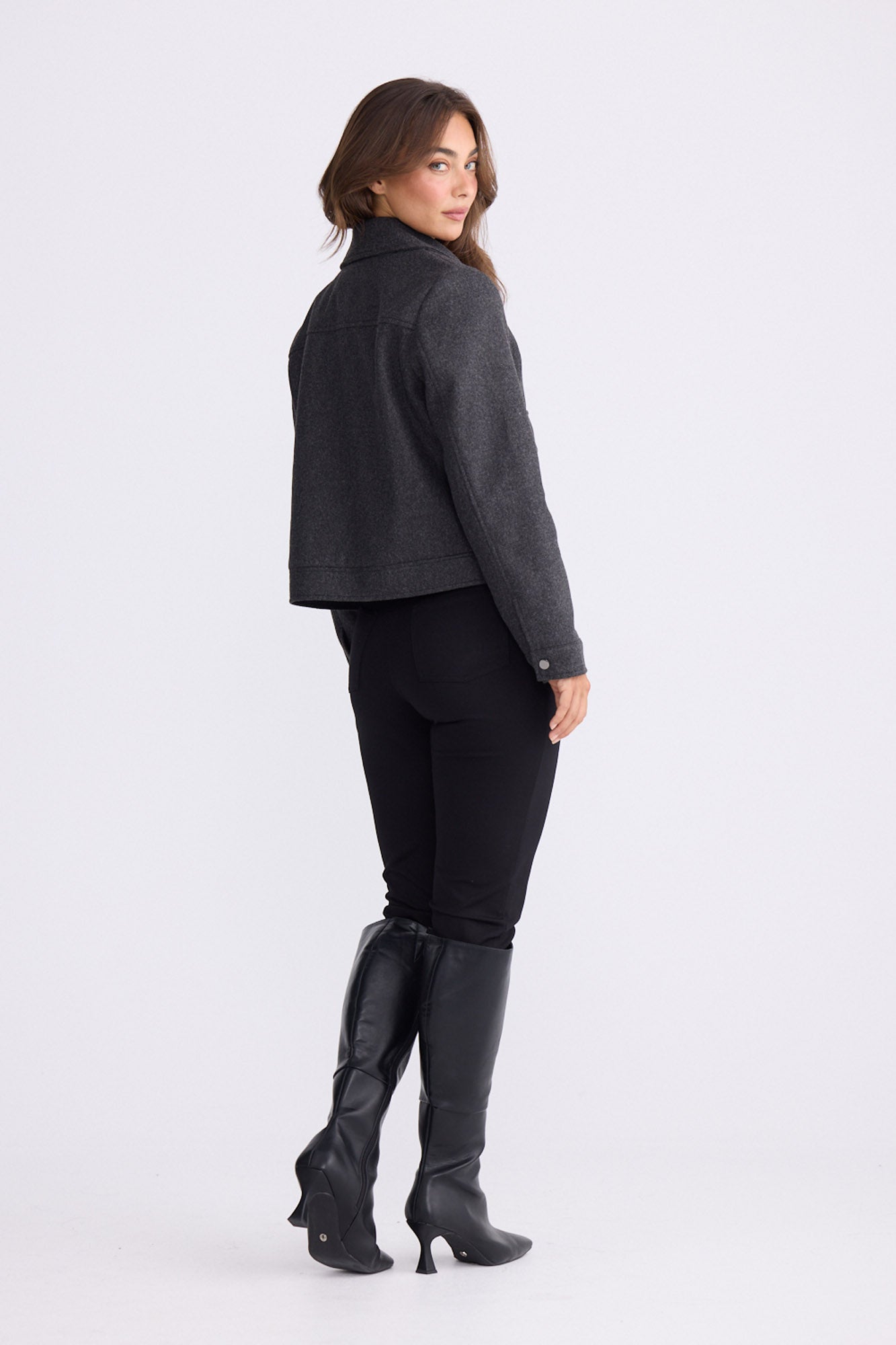 Model wearing Hollis Jacket grey jacket with collared neckline, front pockets with button detail, front view on white background