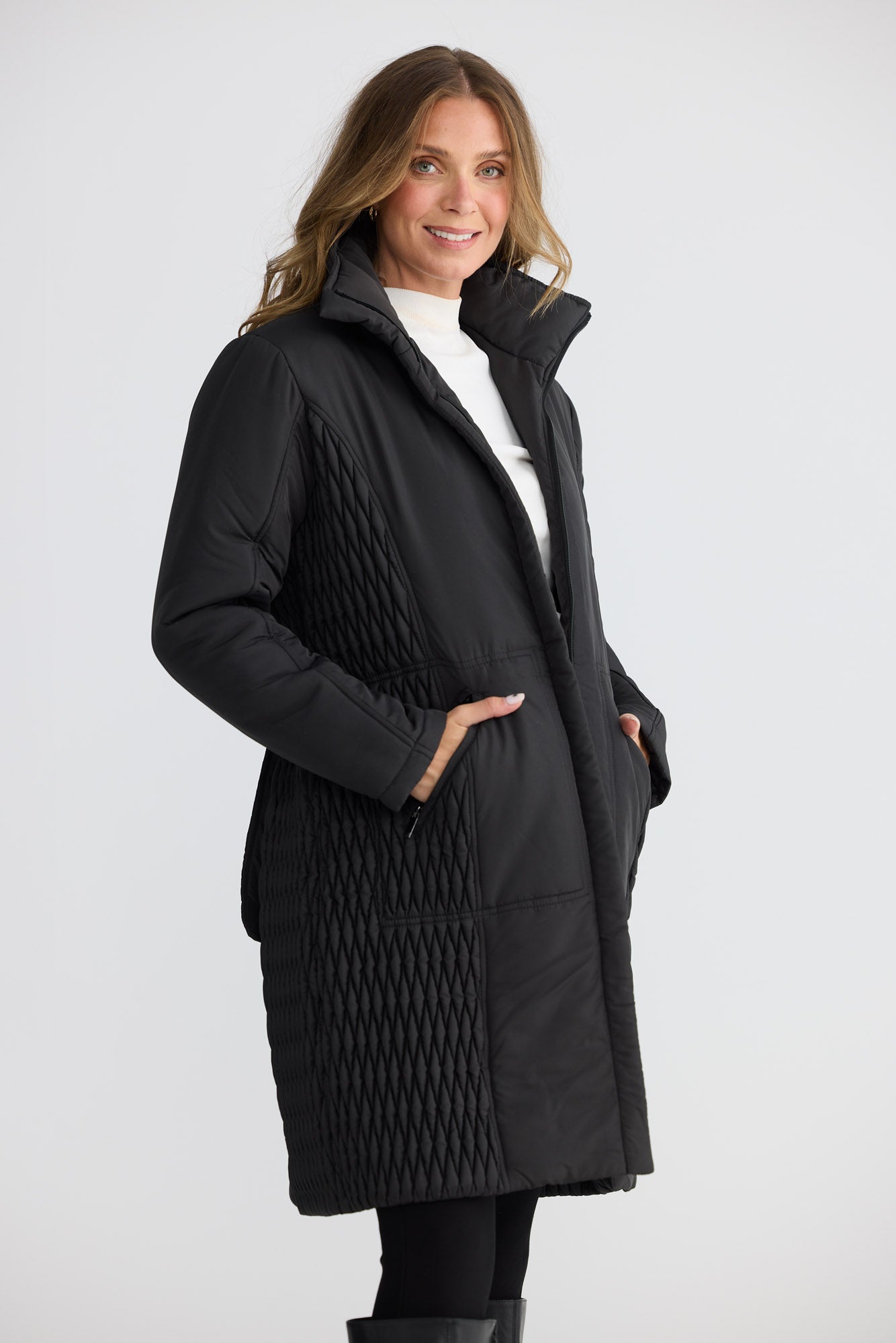 Model wearing Delphine Puffer black puffer jacket, collared neckline, alternate studio view on white background