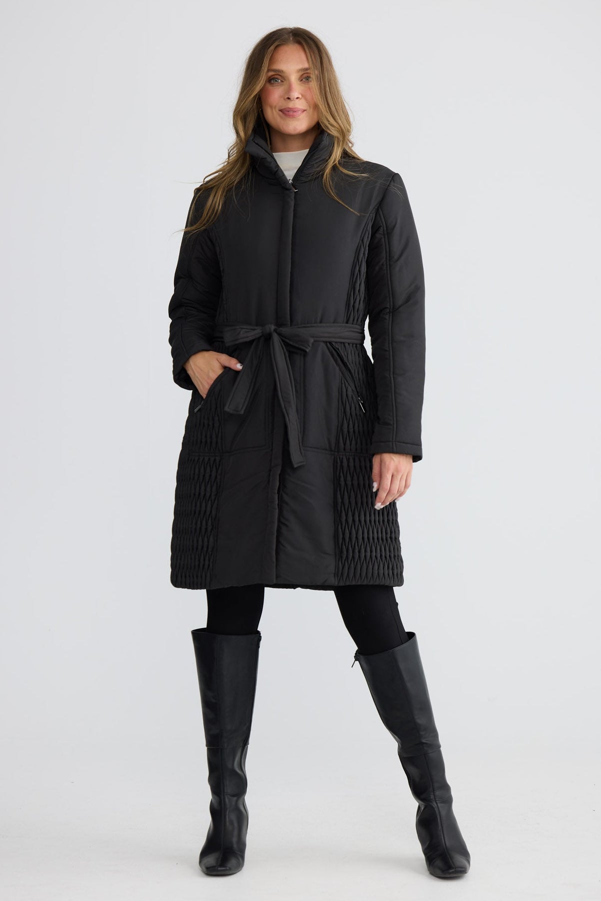 Model wearing Delphine Puffer black puffer jacket, collared neckline, alternate studio view on white background