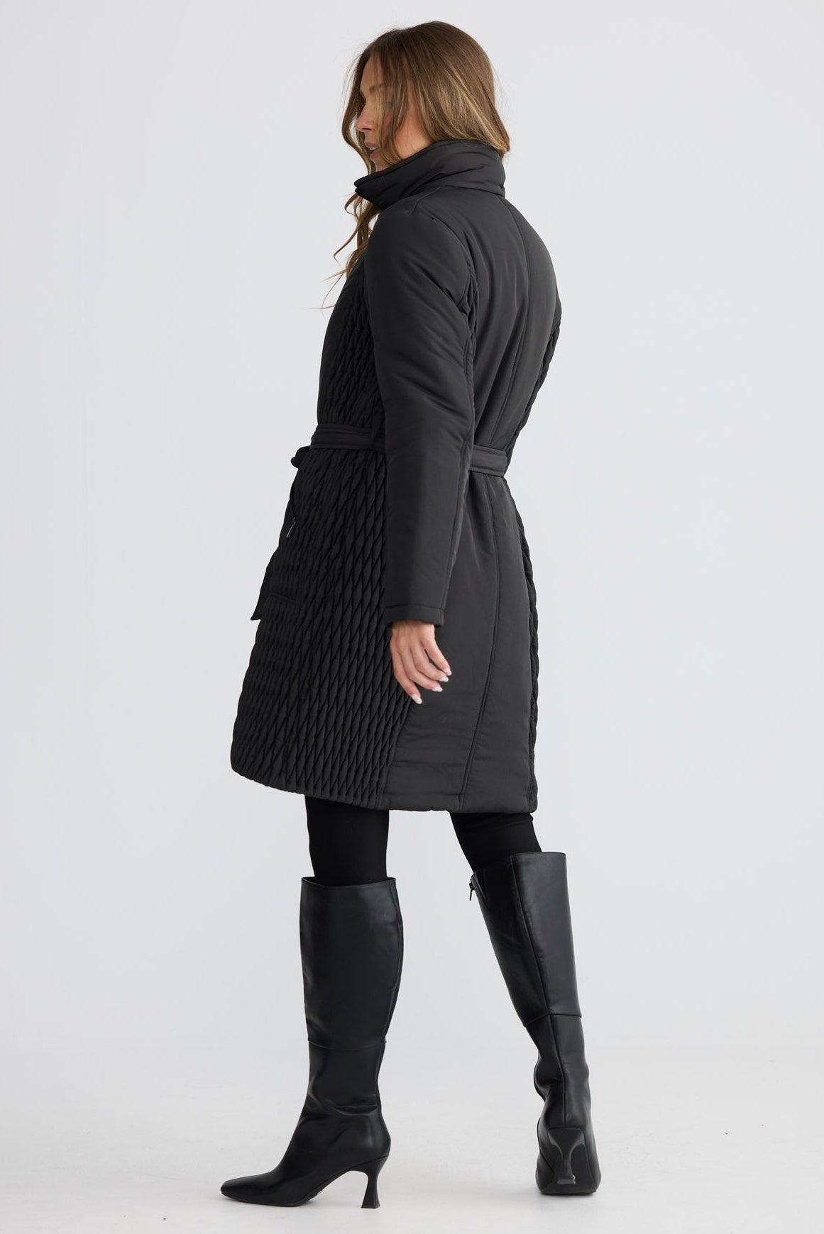Model wearing Delphine Puffer black puffer jacket, collared neckline, alternate studio view on white background