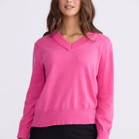 Model wearing Gwen Knit - Hot Pink, alternate studio view on white background