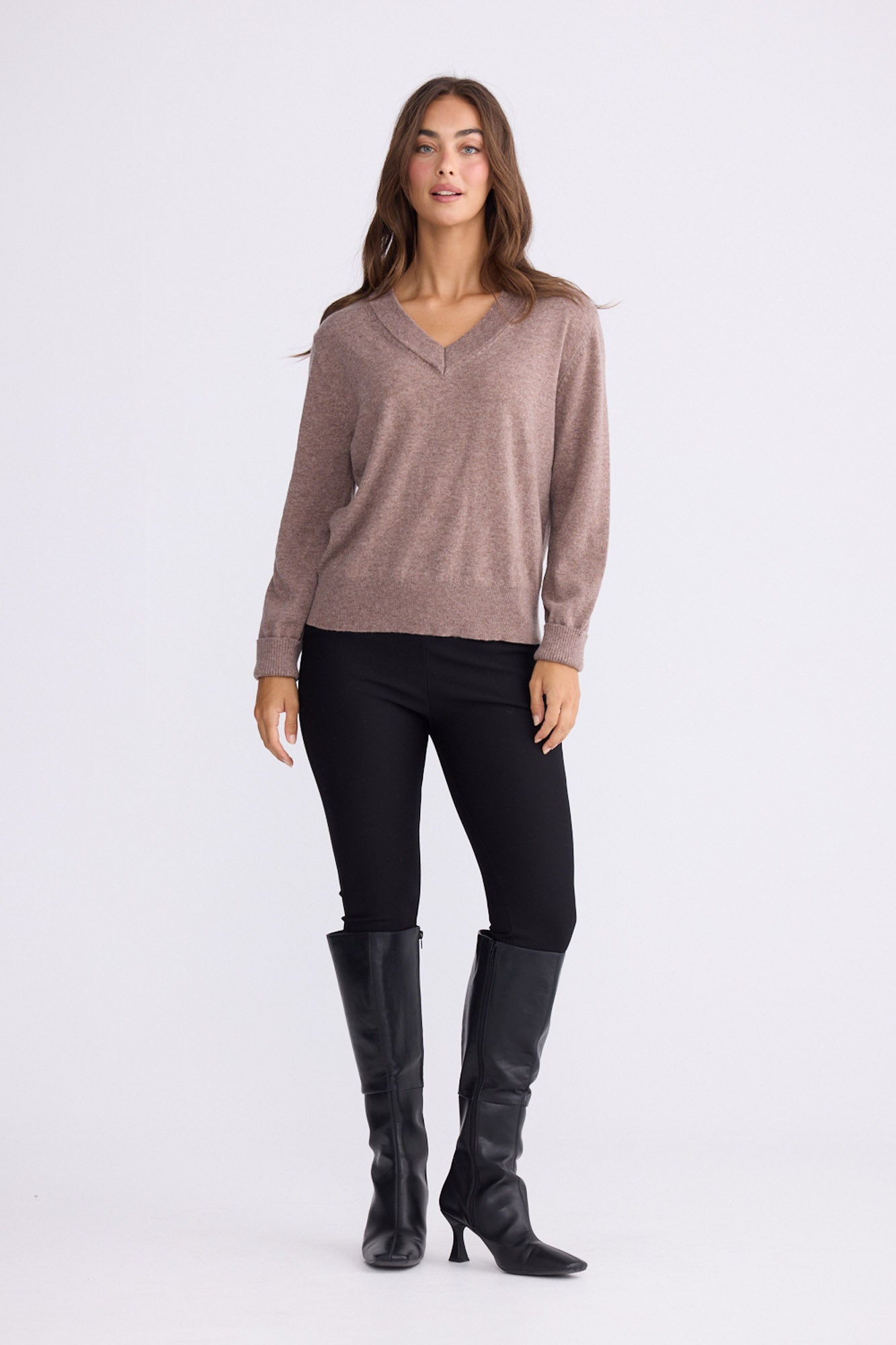 Model wearing Gwen Knit - Oat Marle, alternate studio view on white background