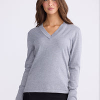 Model wearing Cassian LS Knit Top - Grey, alternate studio view on white background