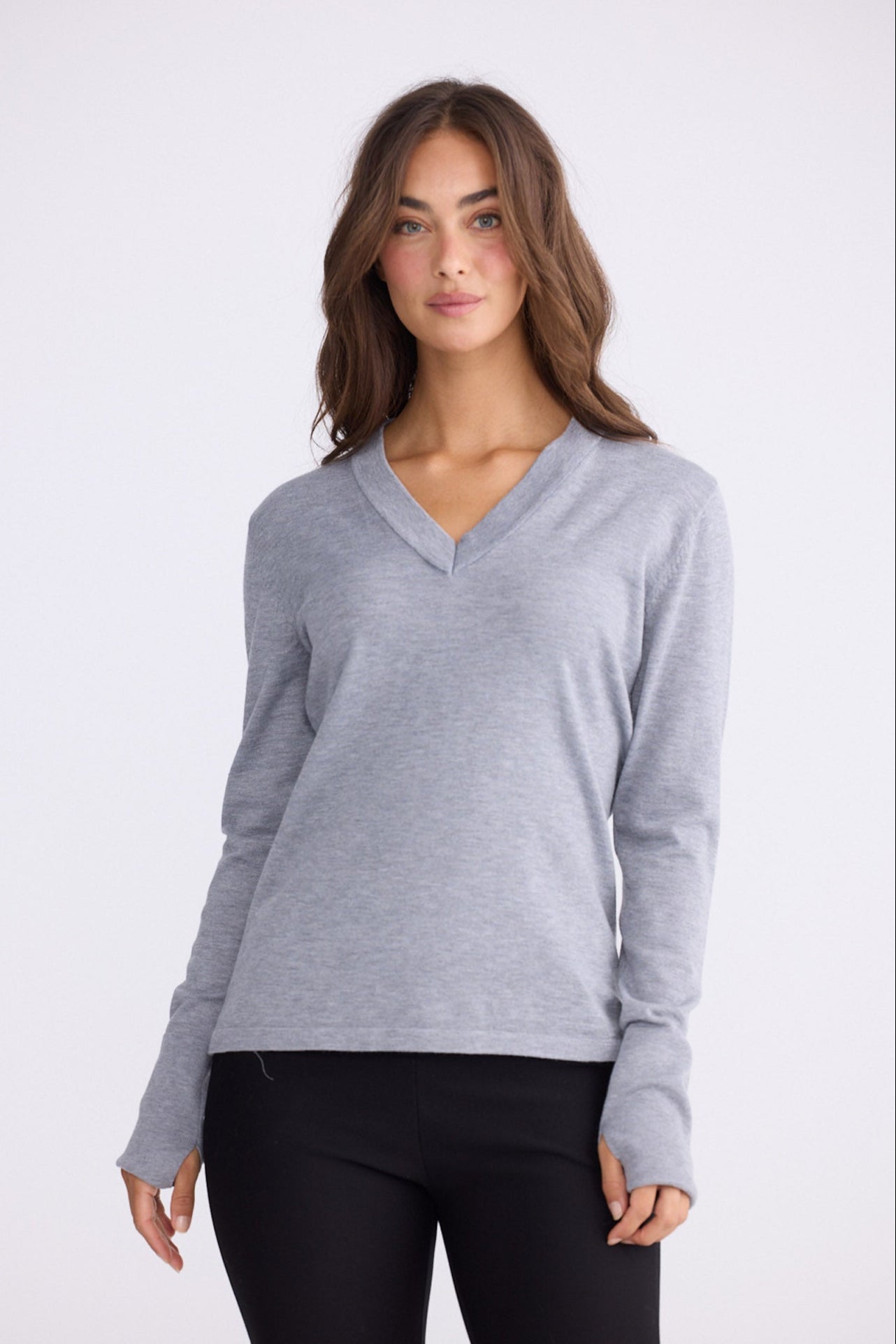 Model wearing Cassian LS Knit Top - Grey, alternate studio view on white background