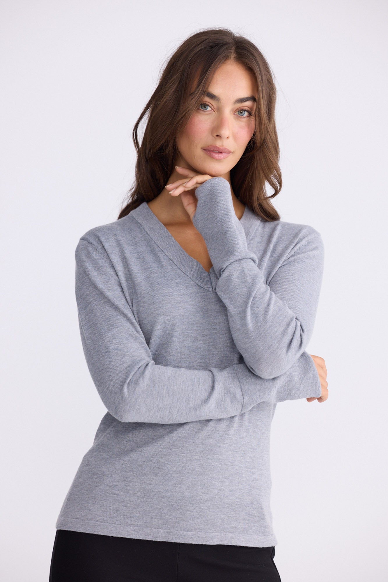 Model wearing Cassian LS Knit Top - Grey, alternate studio view on white background