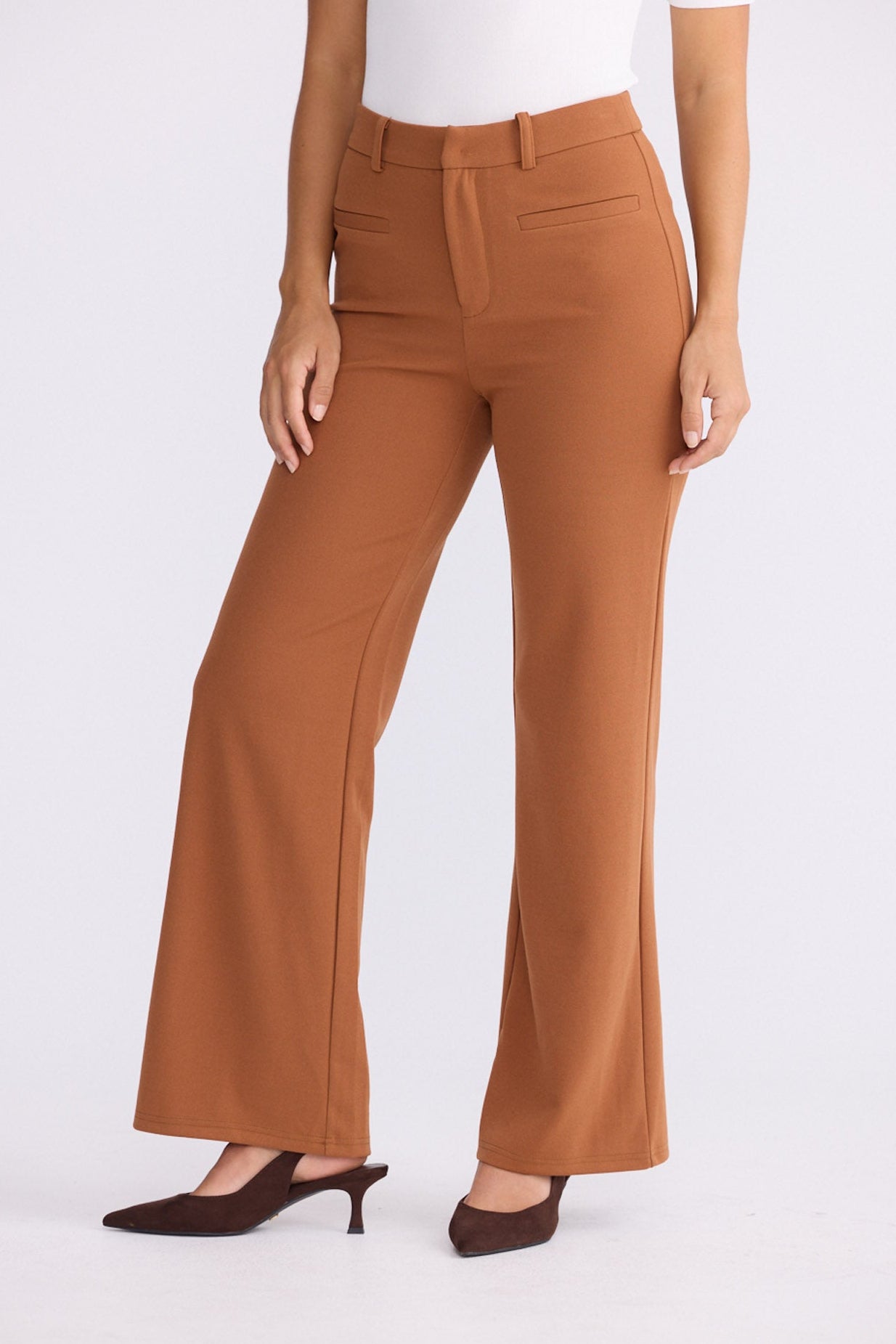 Model wearing Tressa pecan flared pants with high-rise waist, alternate view on white background