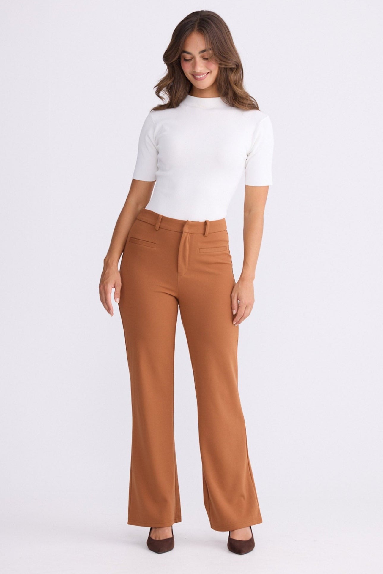 Model wearing Tressa pecan flared pants with high-rise waist, alternate view on white background