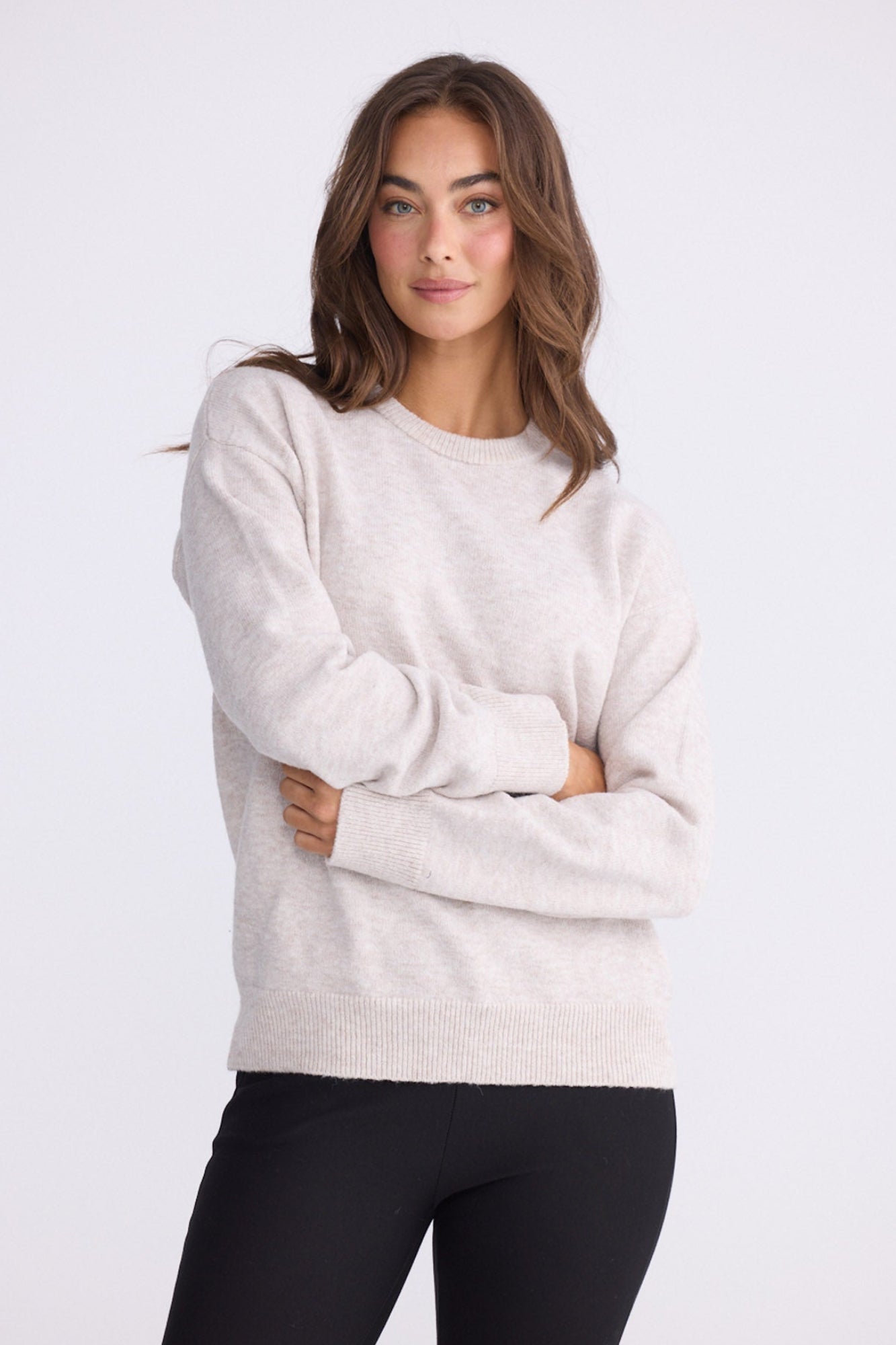 Model wearing Casey Knit - Oat, alternate studio view on white background