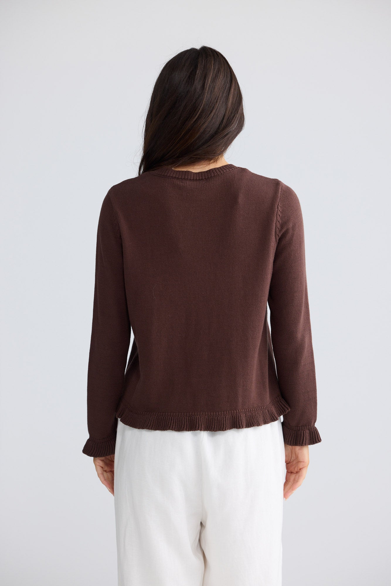 Model wearing Lorrie Frill Cardi in Chocolate by Brave + True, view 4.