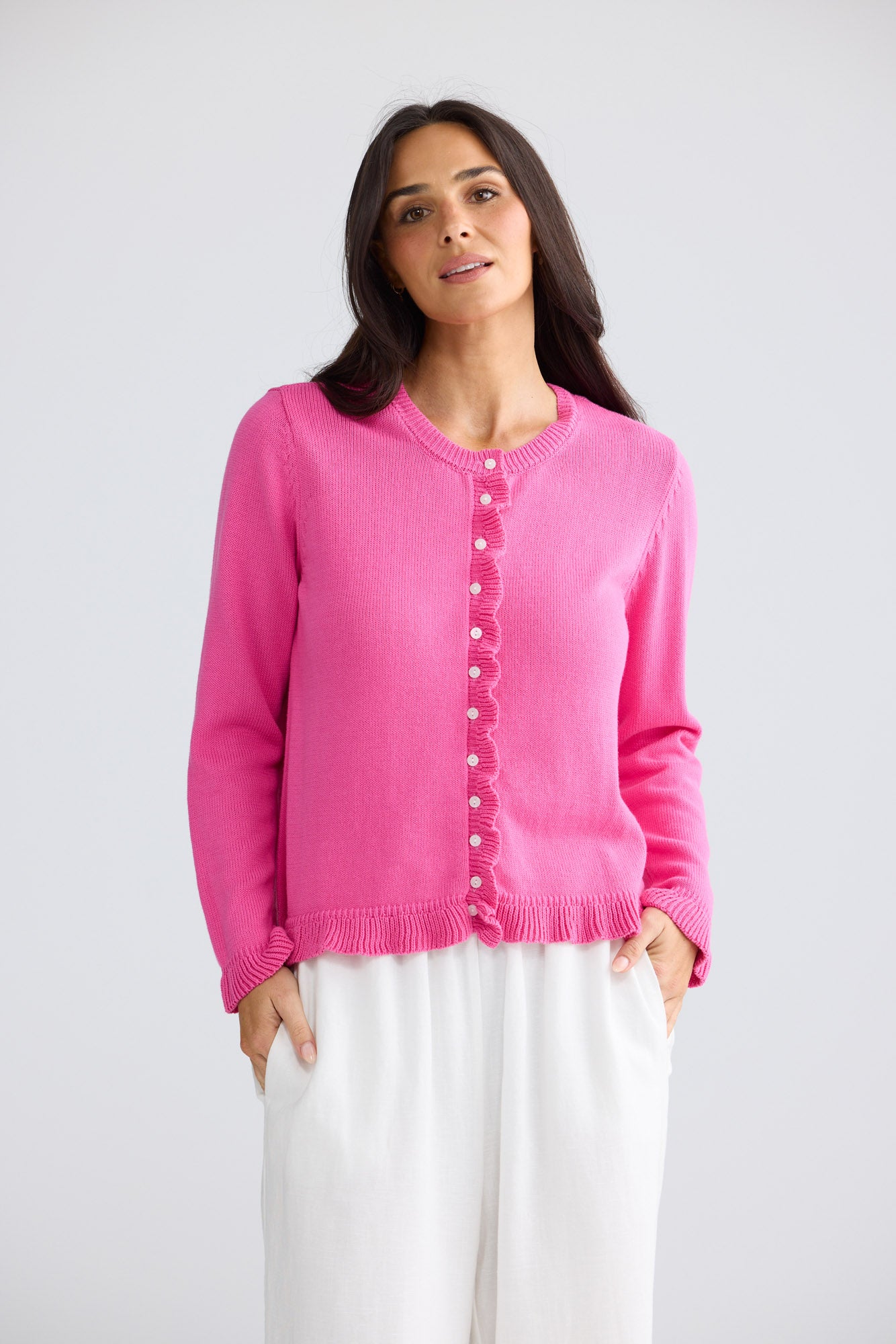 Model wearing Lorrie Frill Cardi in Hot Pink by Brave + True, view 2.