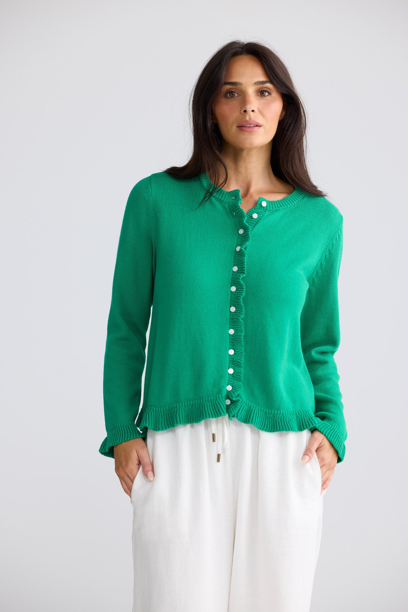 Model wearing Lorrie Frill Cardi in Jade by Brave + True, view 2.