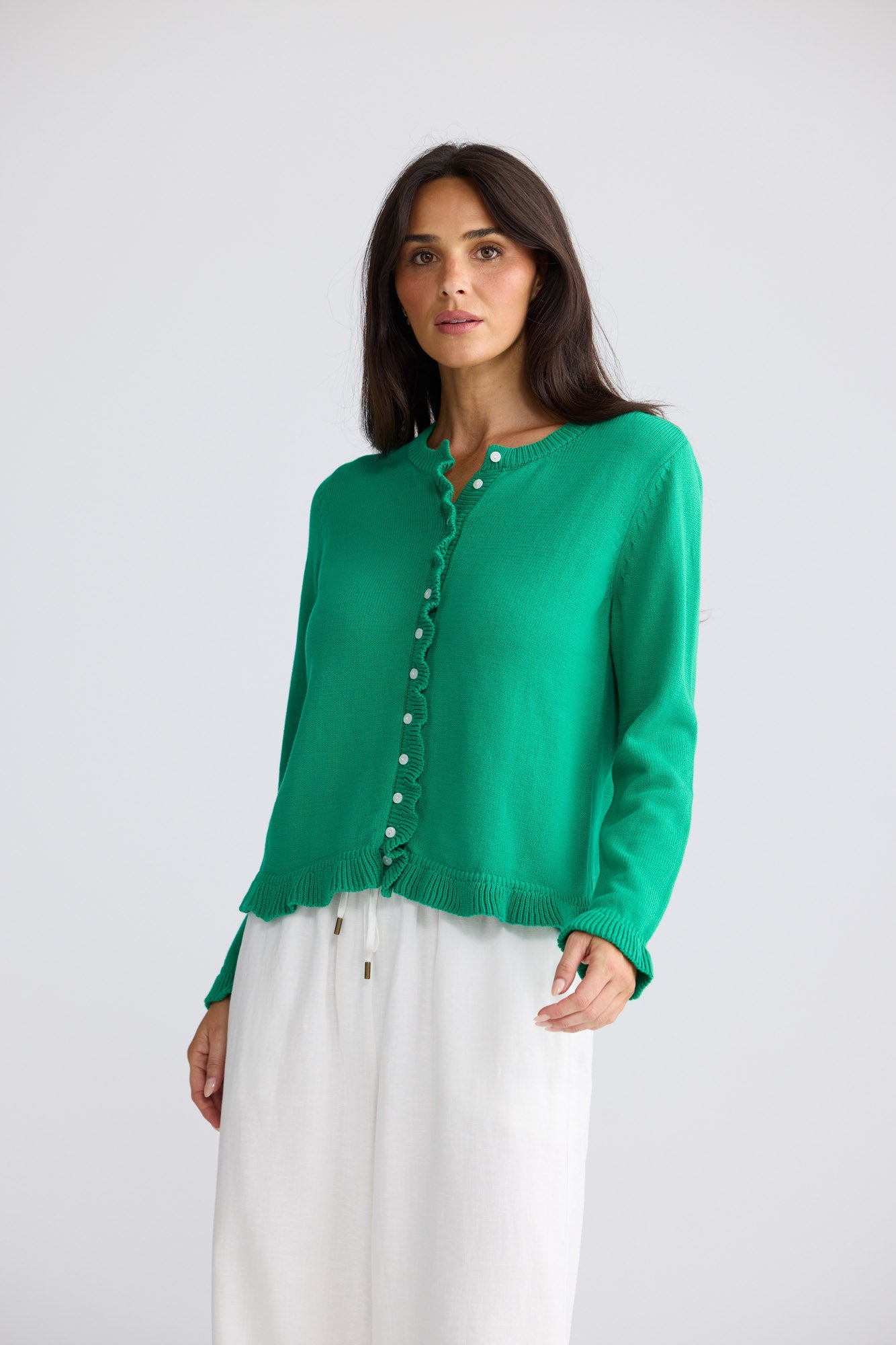Model wearing Lorrie Frill Cardi in Jade by Brave + True, view 4.