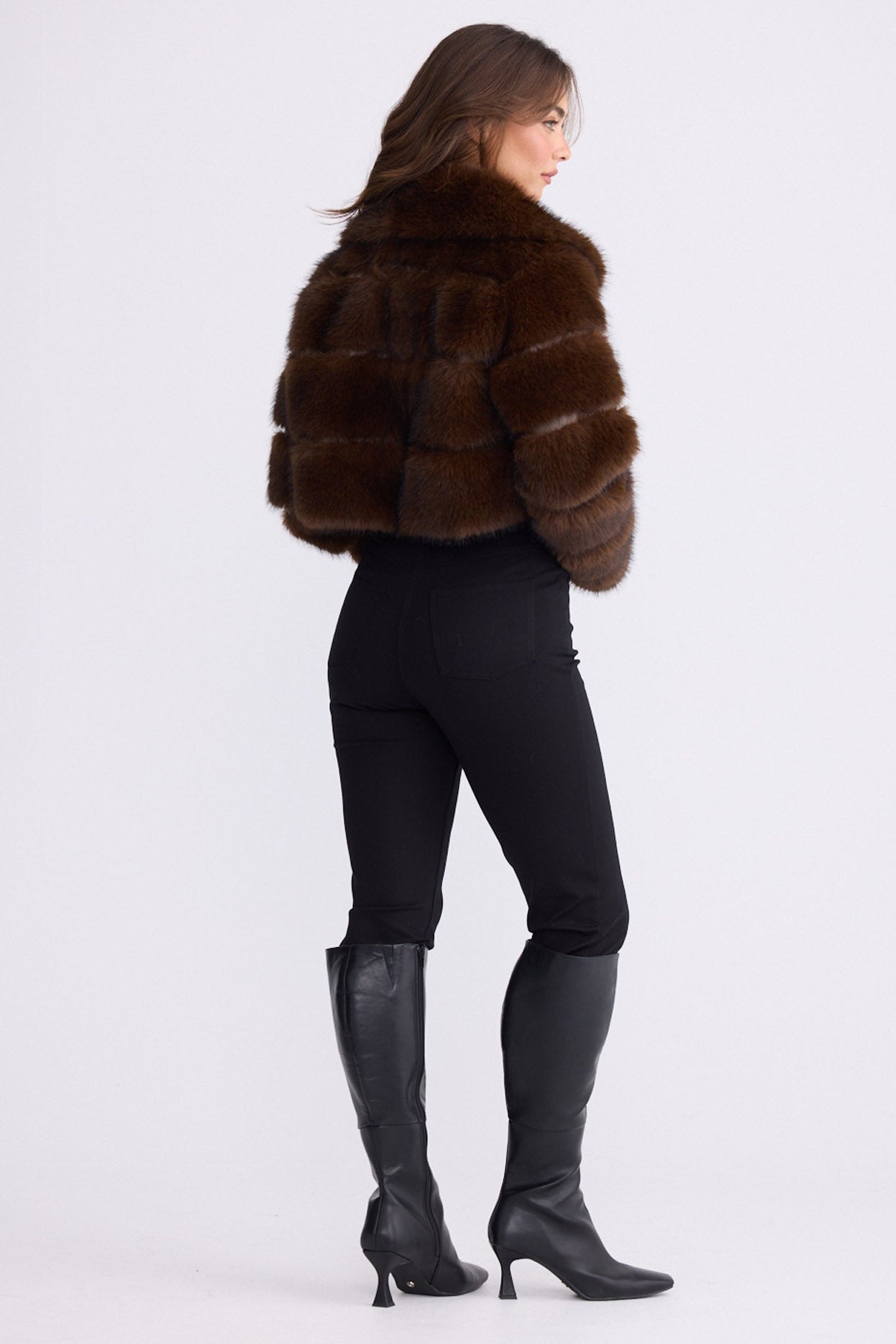 Model wearing Daria Fur Jacket brown jacket with collared neckline, zip-through front closure, front view on white background