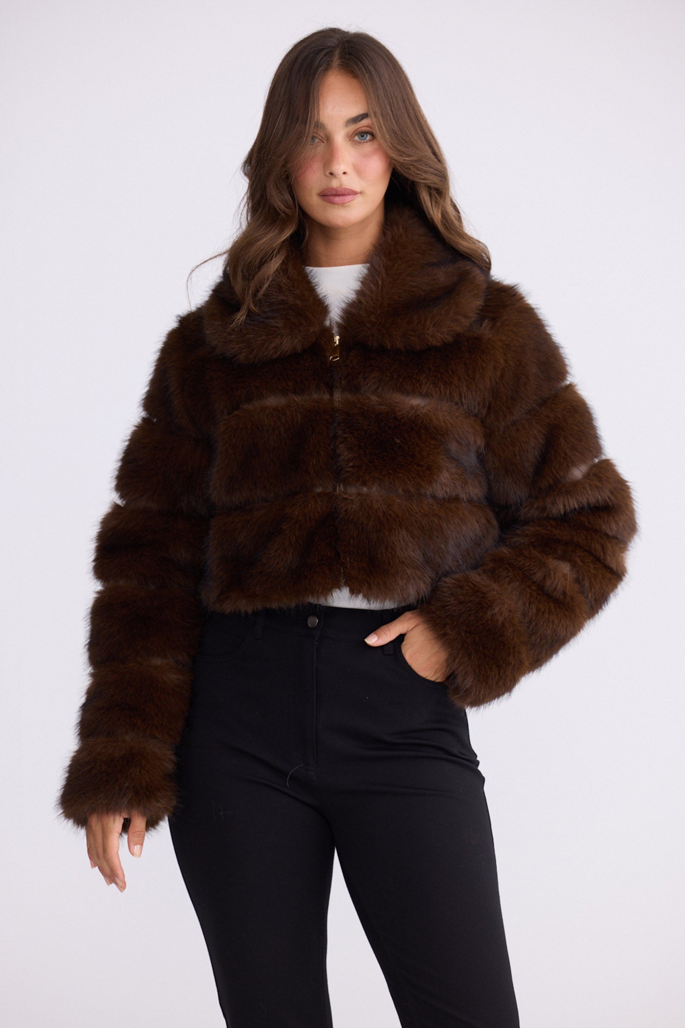 Model wearing Daria Fur Jacket brown jacket, zip-through front closure, alternate studio view on white background
