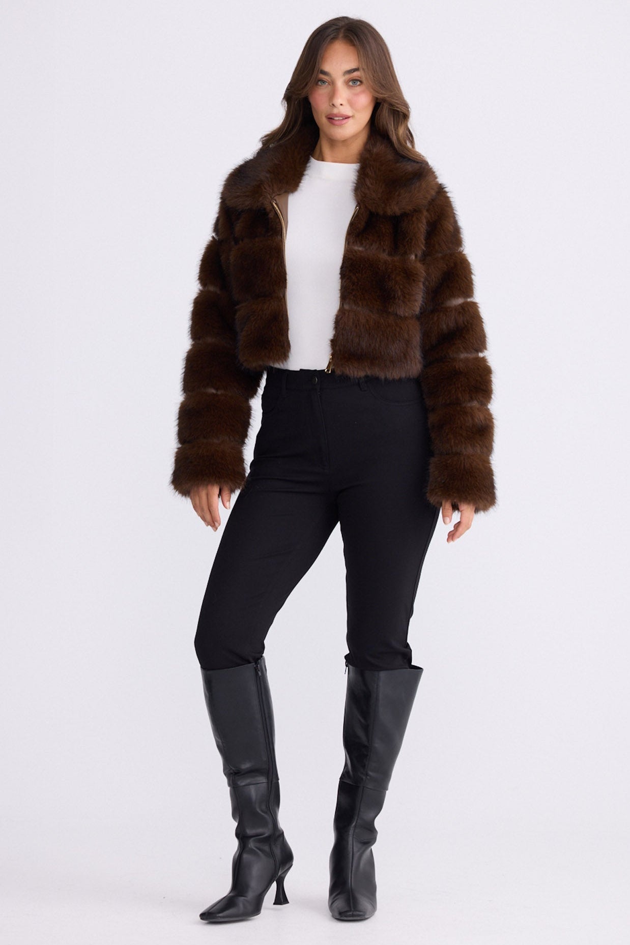 Model wearing Daria Fur Jacket brown jacket, zip-through front closure, alternate studio view on white background