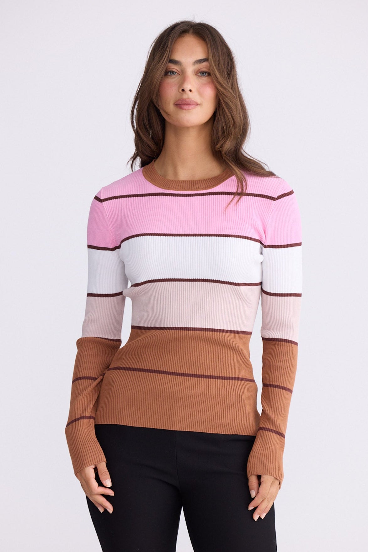 Model wearing Unley rose stripe rib knit top with fitted shape and long sleeves, alternate view on white background