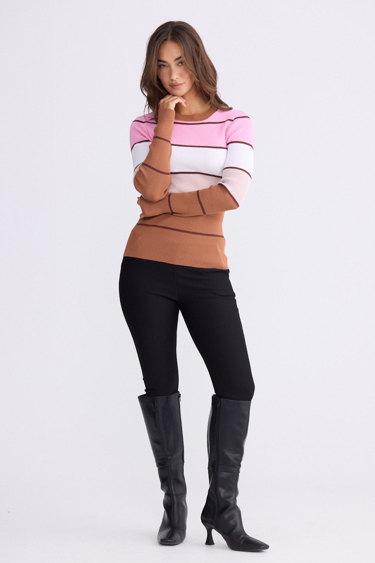 Model wearing Unley rose stripe rib knit top with fitted shape and long sleeves, alternate view on white background