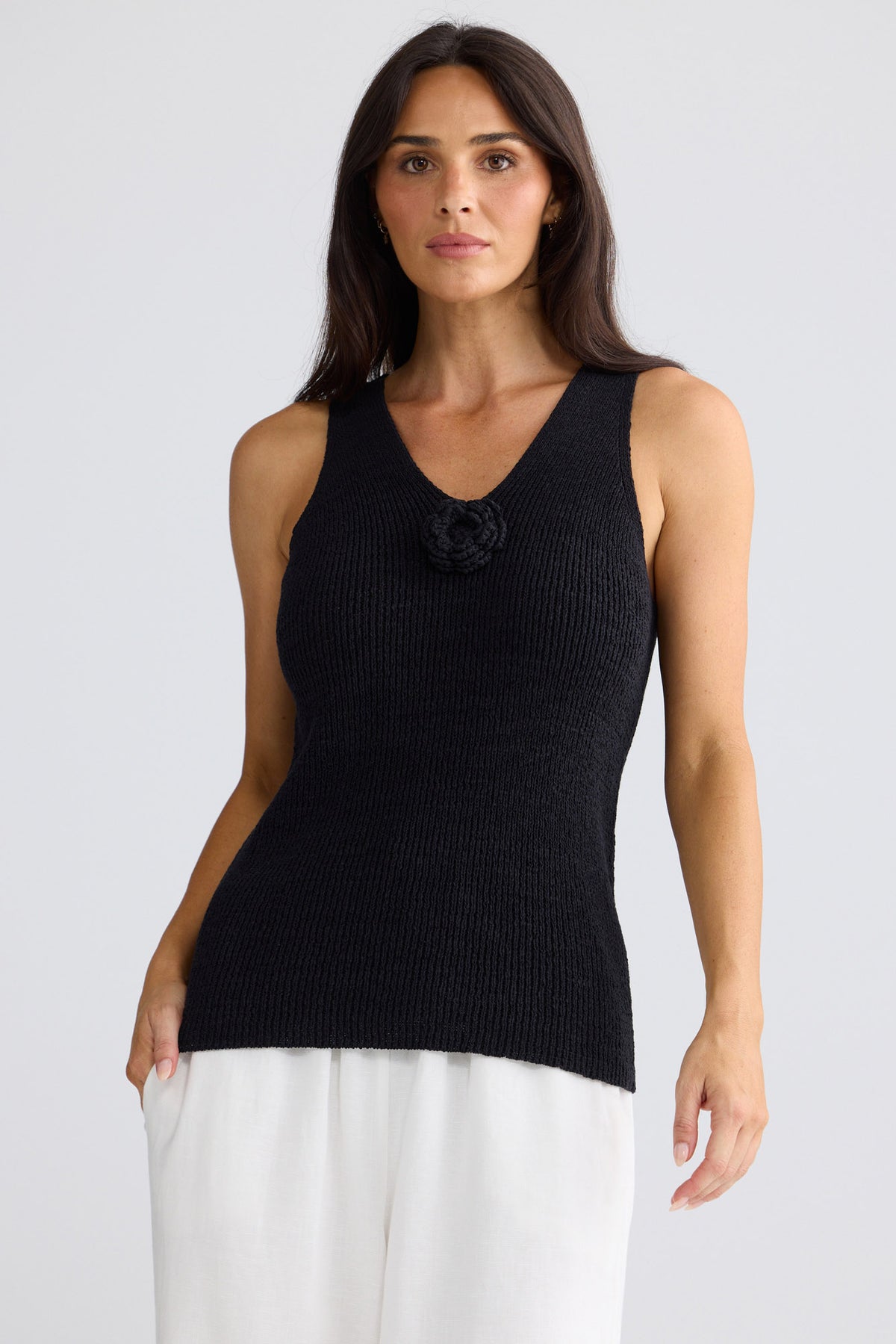 Model wearing Rosalie Knit Tank in Black by Brave + True, view 3.