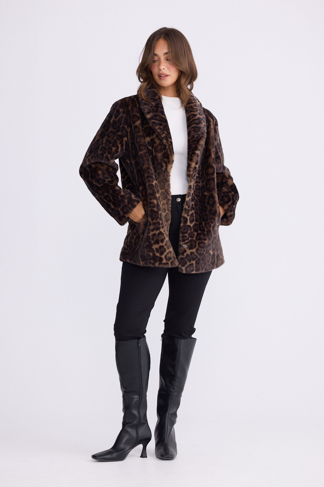 Model wearing Katerina Fur Jacket in leopard with shawl collar and long sleeves, front view on white background
