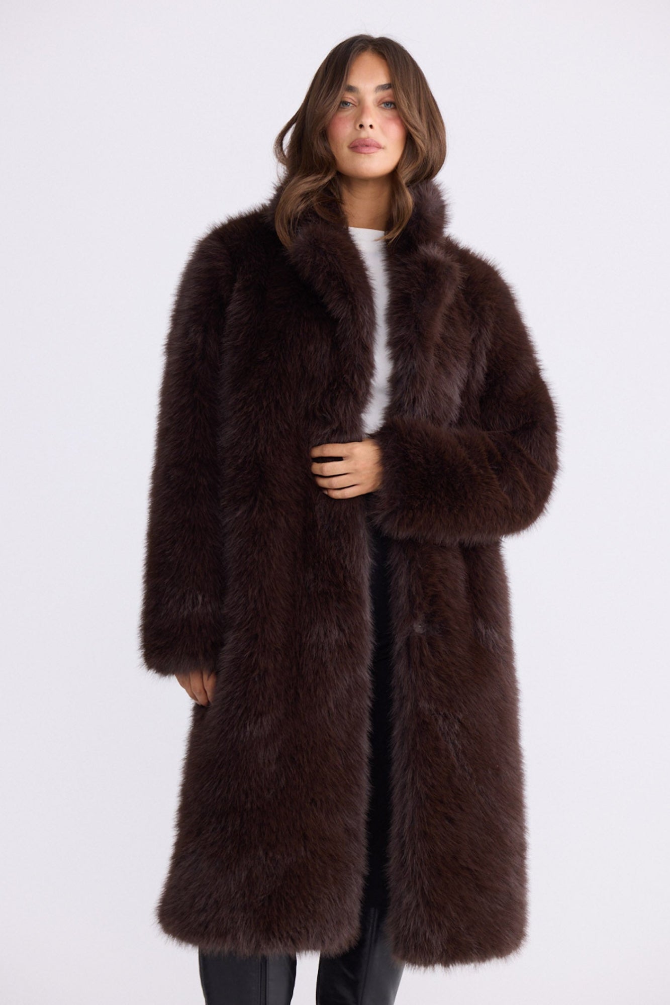 Model wearing Angela Fur Coat brown coat with notched lapel collar, alternate studio view on white background