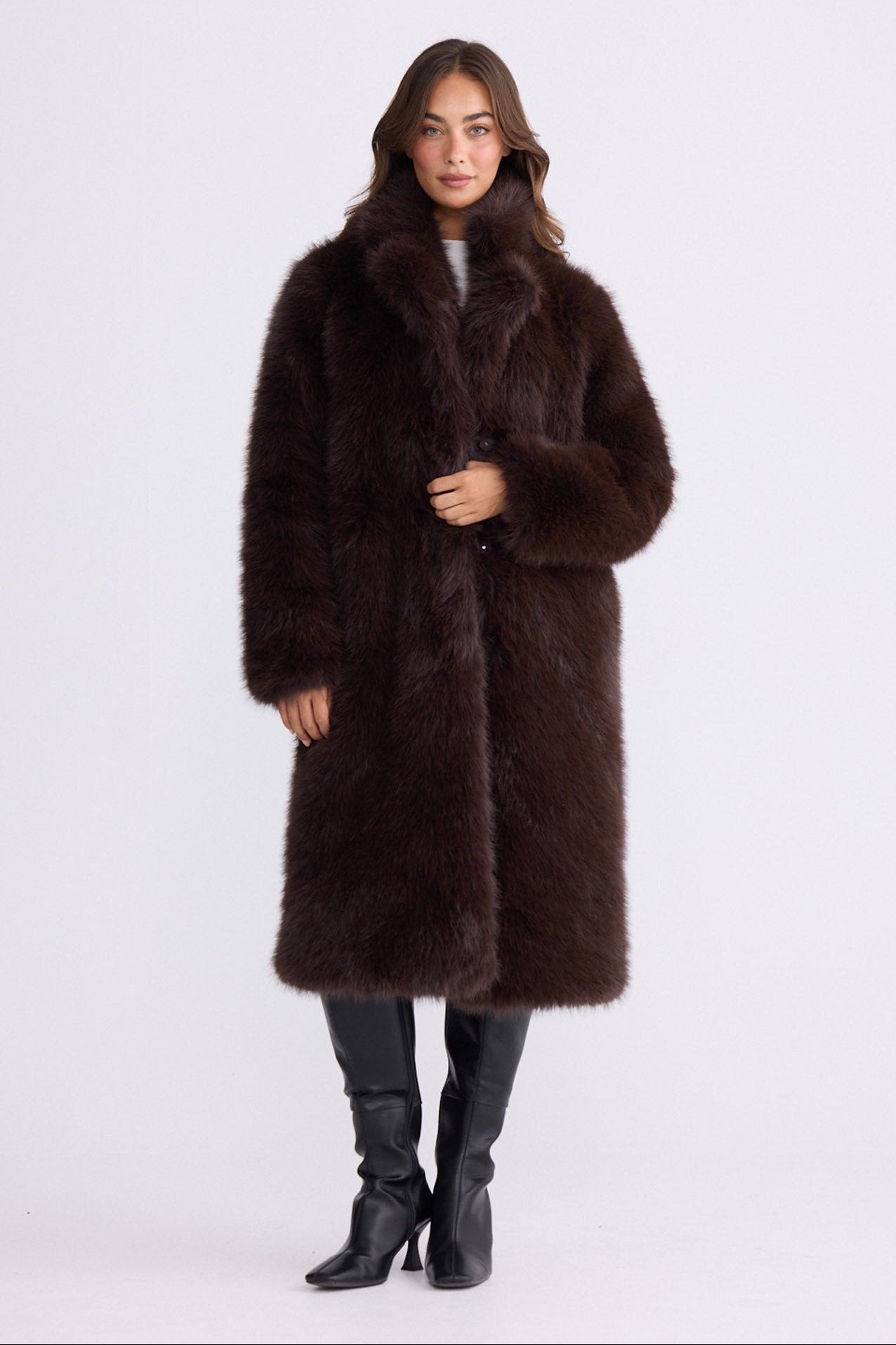 Model wearing Angela Fur Coat brown coat with notched lapel collar, front view on white background