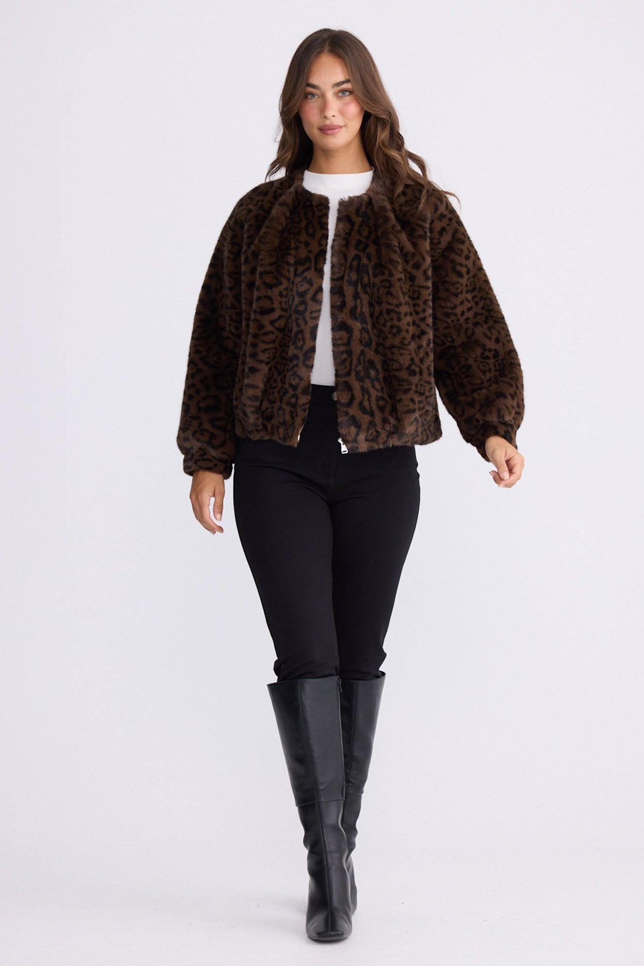 Model wearing Alya Fur Jacket brown animal-print jacket, zip-through front closure, alternate studio view on white background