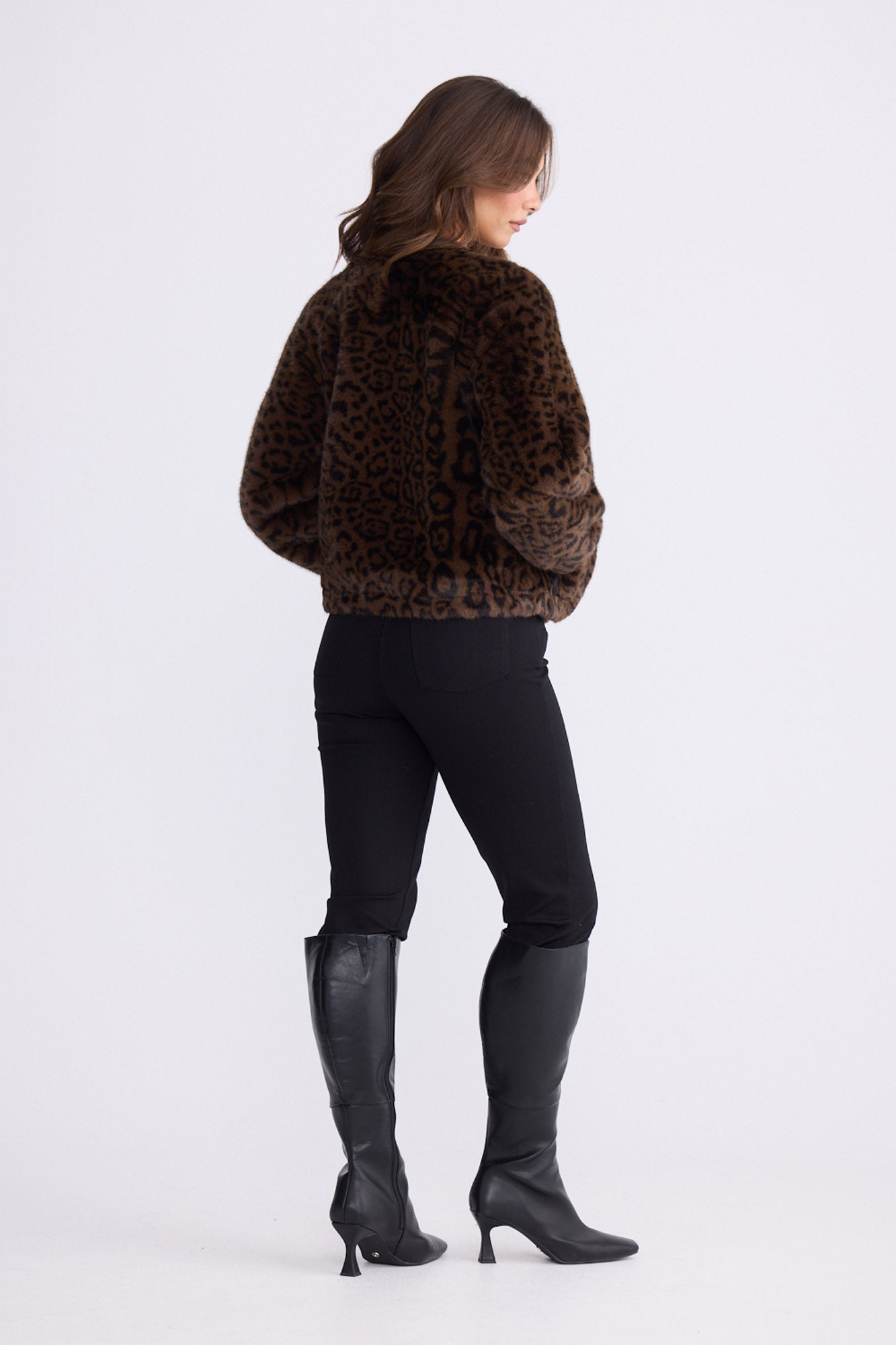 Model wearing Alya Fur Jacket brown animal-print jacket, zip-through front closure, alternate studio view on white background