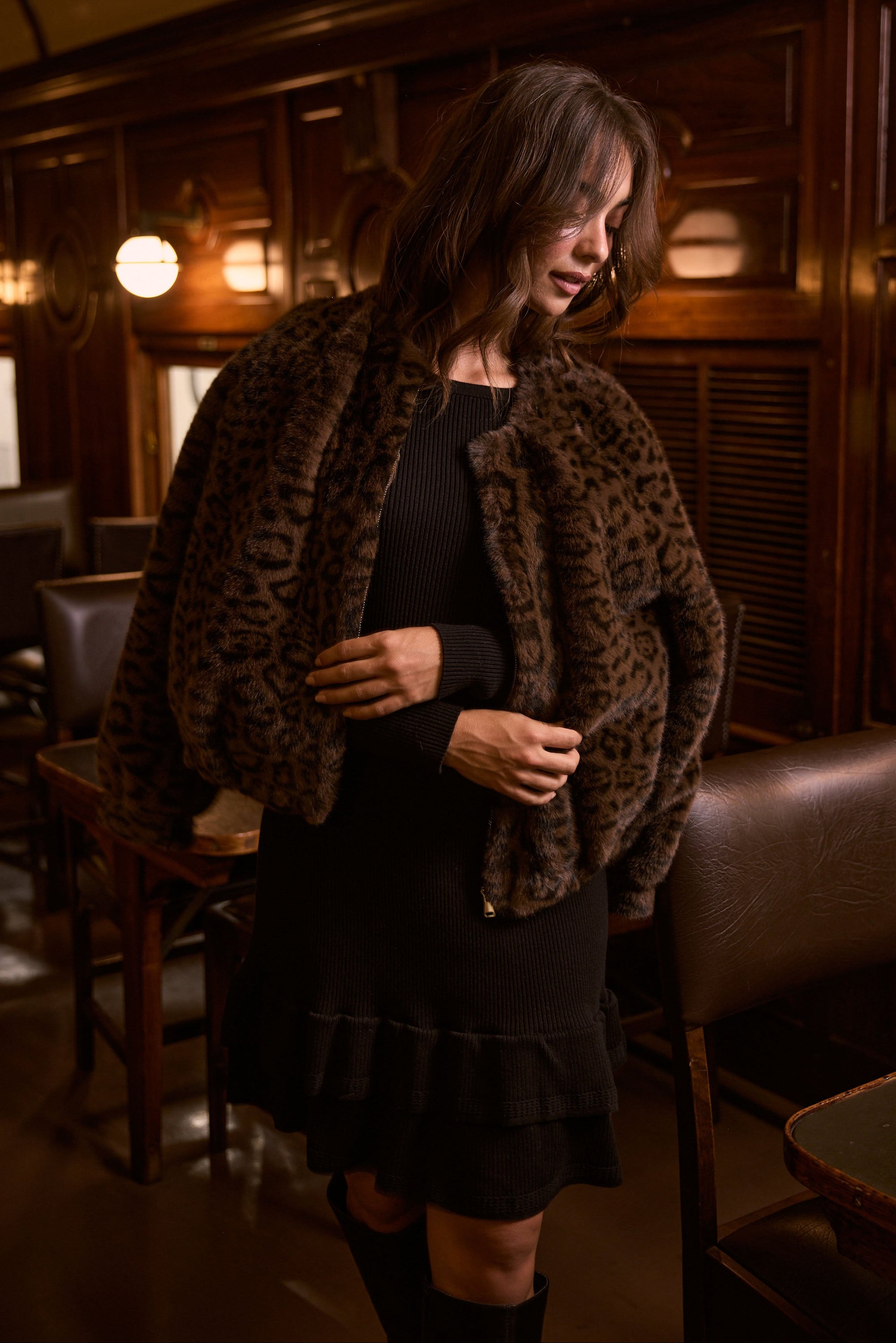 Model wearing Alya Fur Jacket brown animal-print jacket, zip-through front closure, alternate studio view on white background