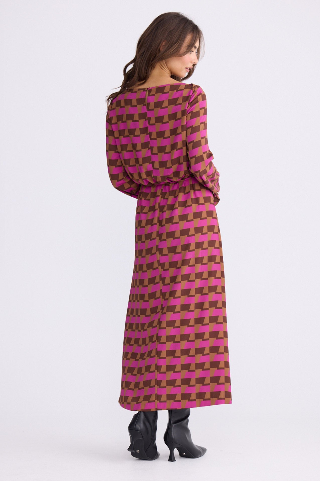Model wearing Kensington Dress in geo prism with boat neckline and long sleeves, front view on white background