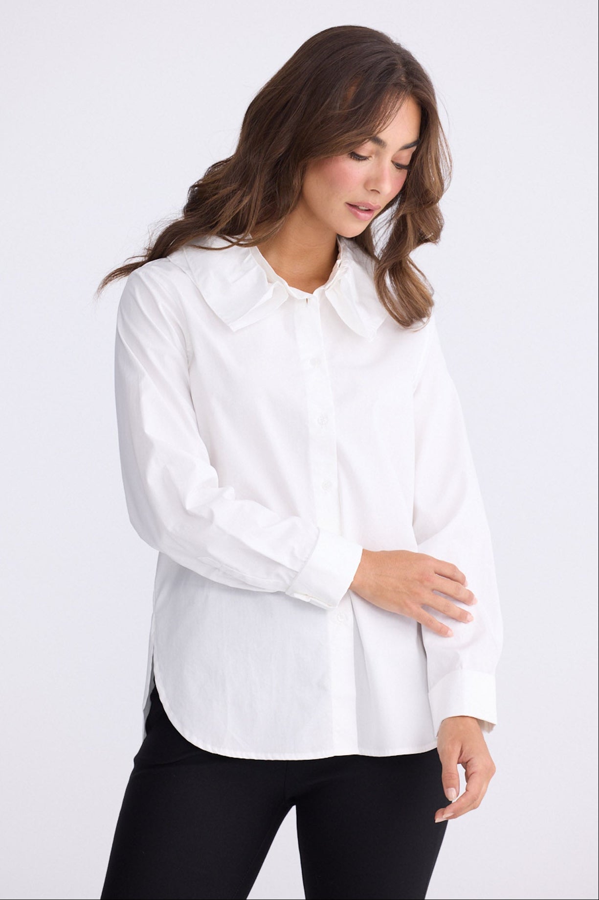 Model wearing Tristen white cotton shirt with detachable frill collar, alternate view on white background