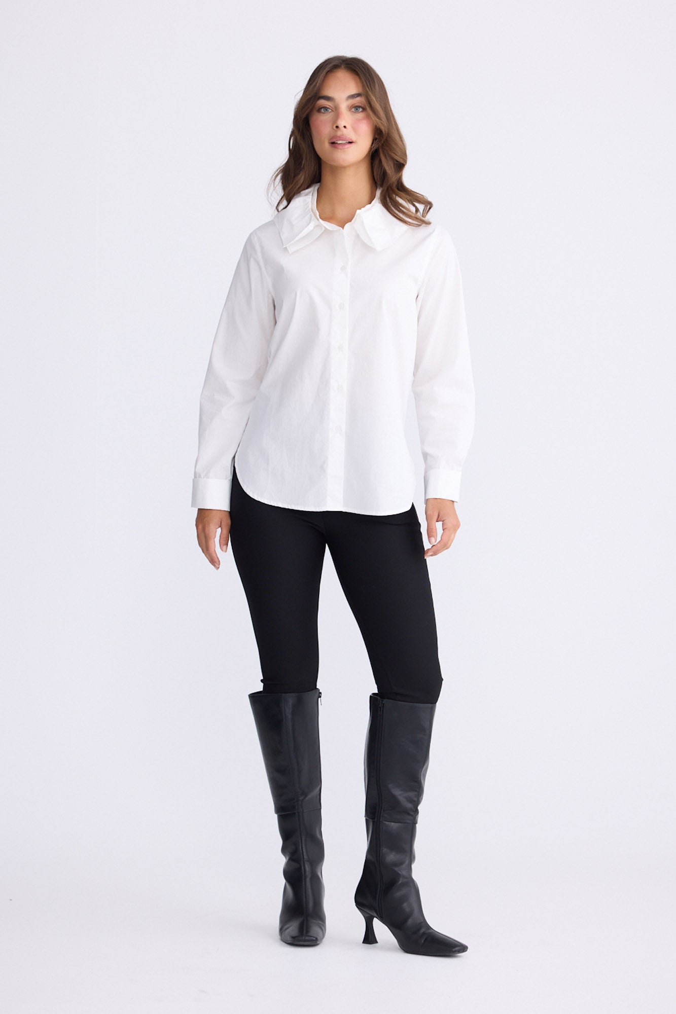 Model wearing Tristen white cotton shirt with detachable frill collar, front view on white background