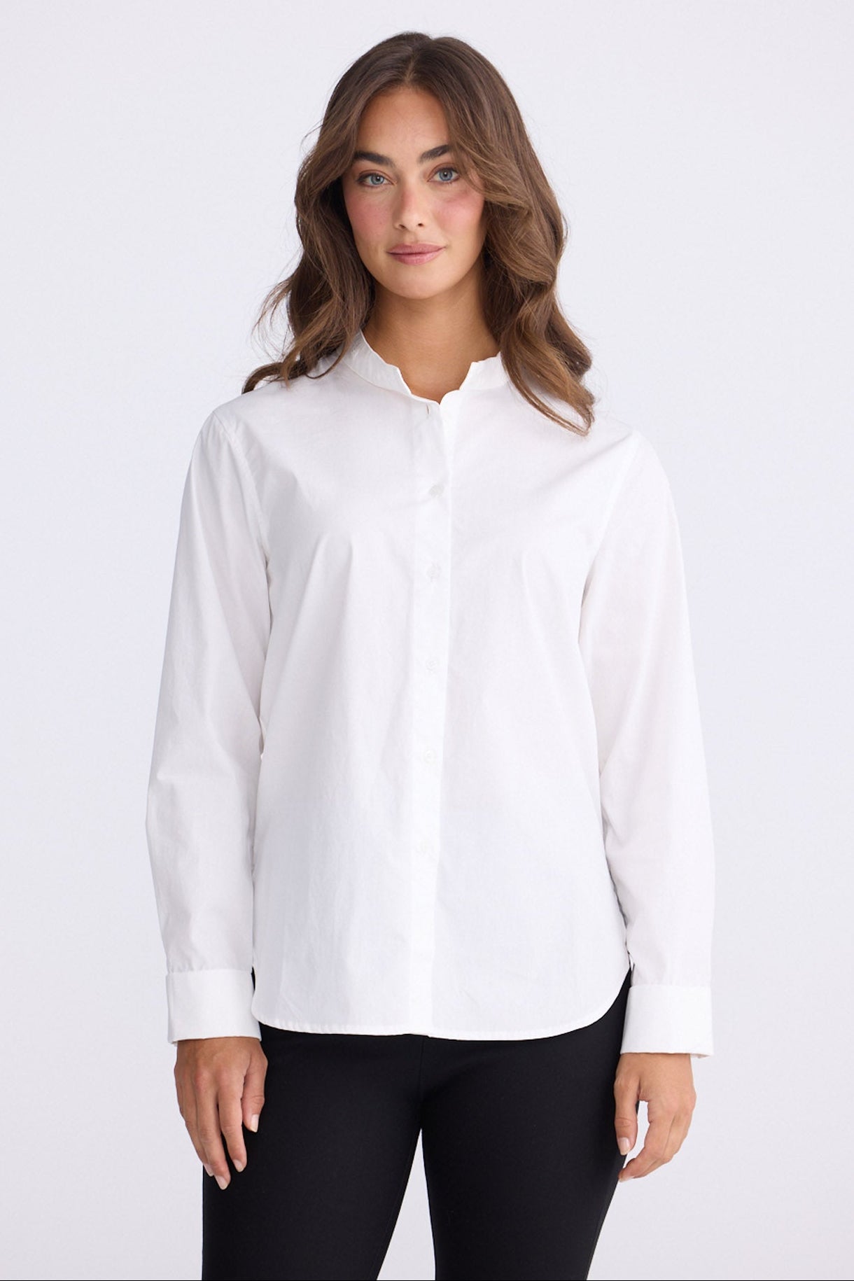 Model wearing Tristen white cotton shirt with detachable frill collar, alternate view on white background