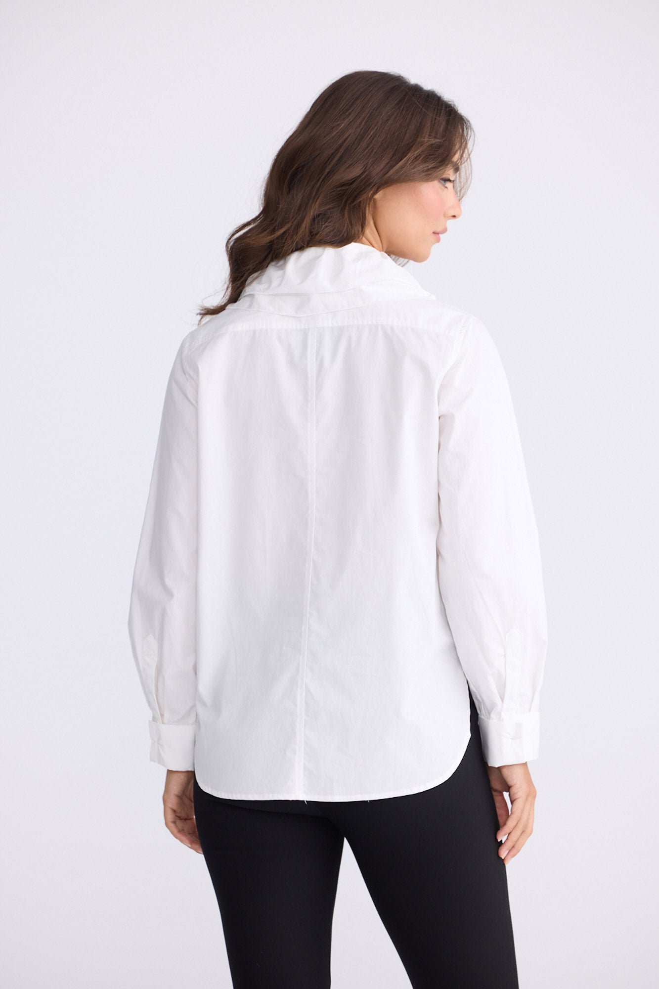 Model wearing Tristen white cotton shirt with detachable frill collar, alternate view on white background