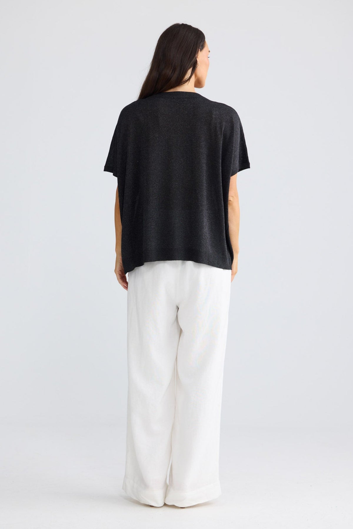 Model wearing Jessamy Top in Black W Silver by Brave + True, view 3.