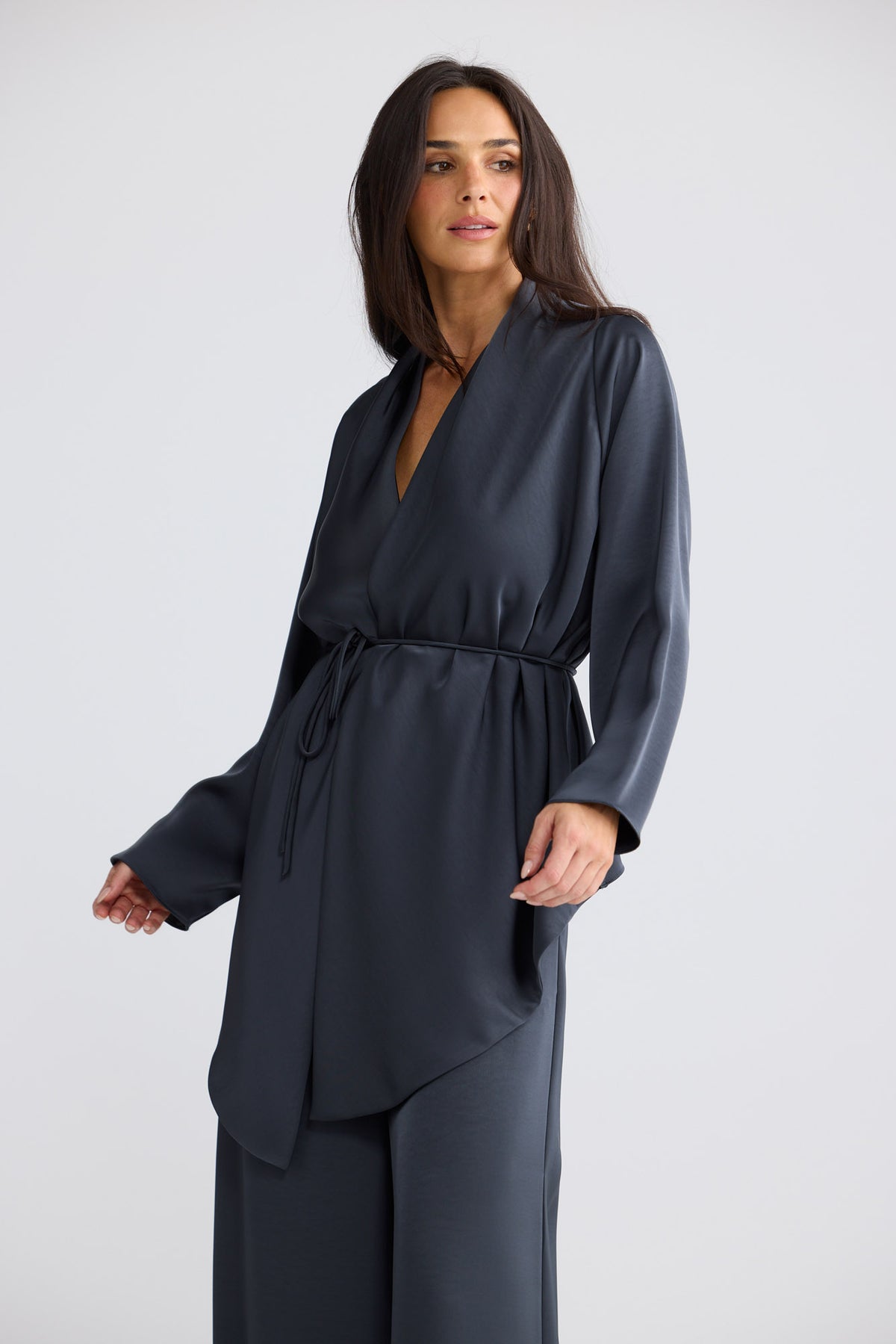 Model wearing Kaleigh Wrap Top in Graphite by Brave + True, view 3.