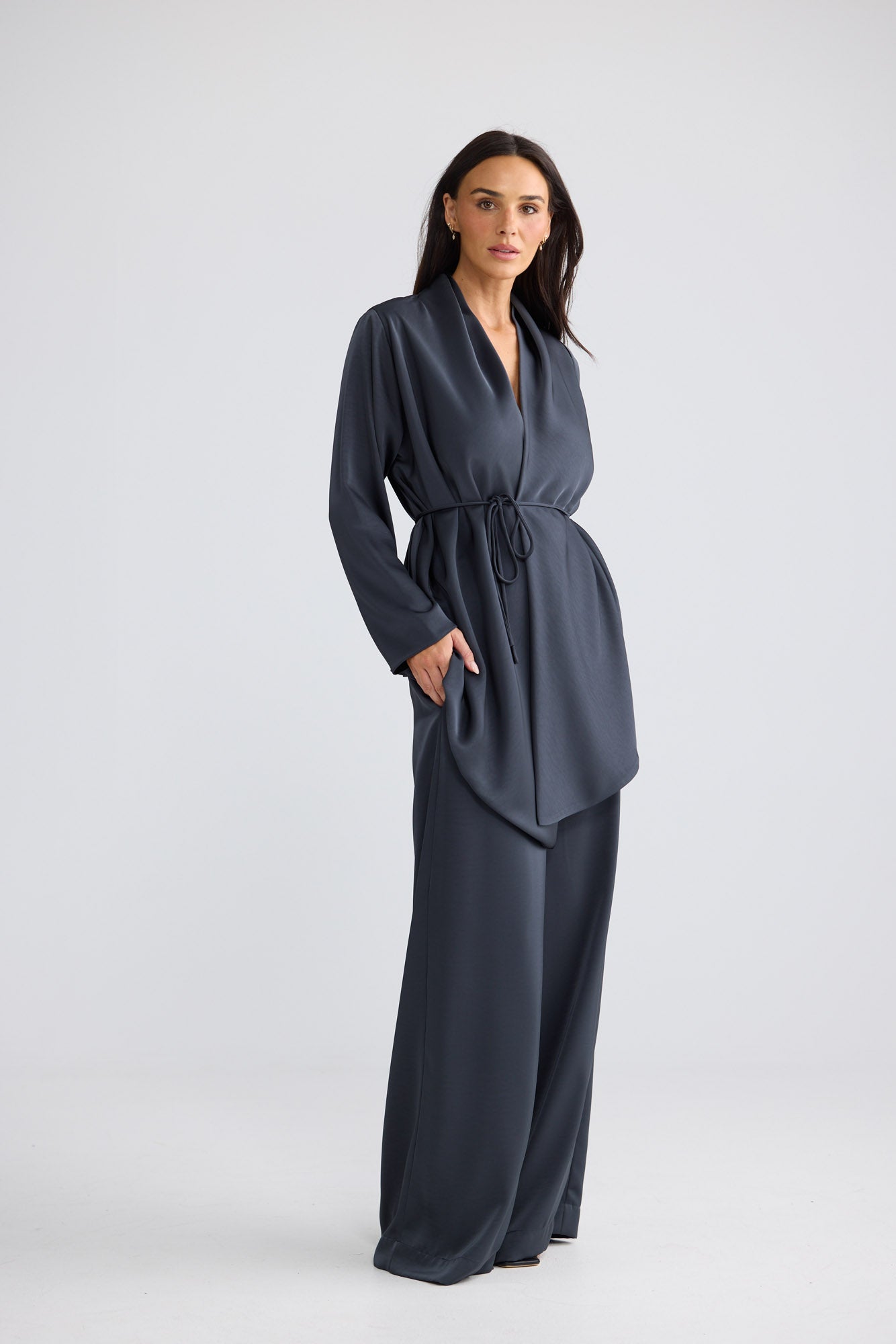 Model wearing Kaleigh Wrap Top in Graphite by Brave + True, view 4.