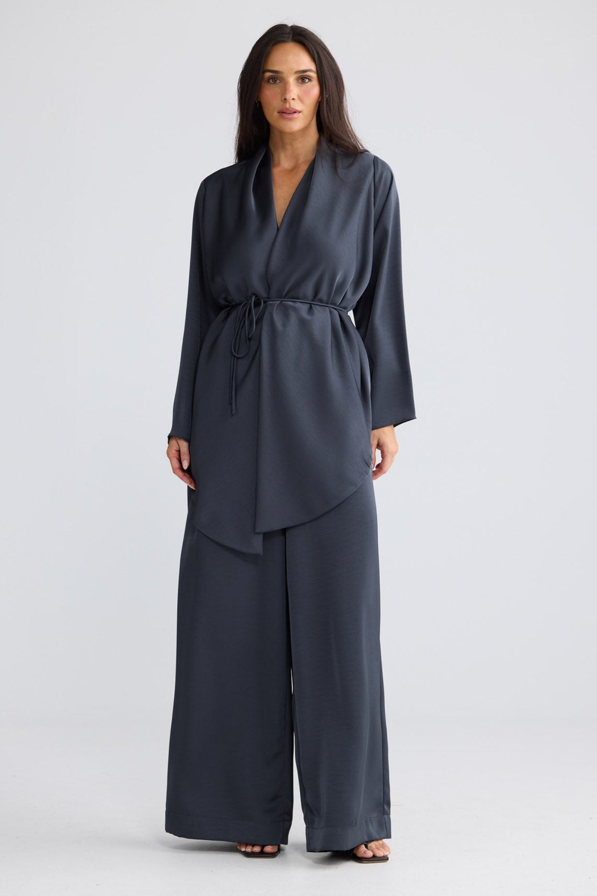 Model wearing Kaleigh Wrap Top in Graphite by Brave + True, view 5.