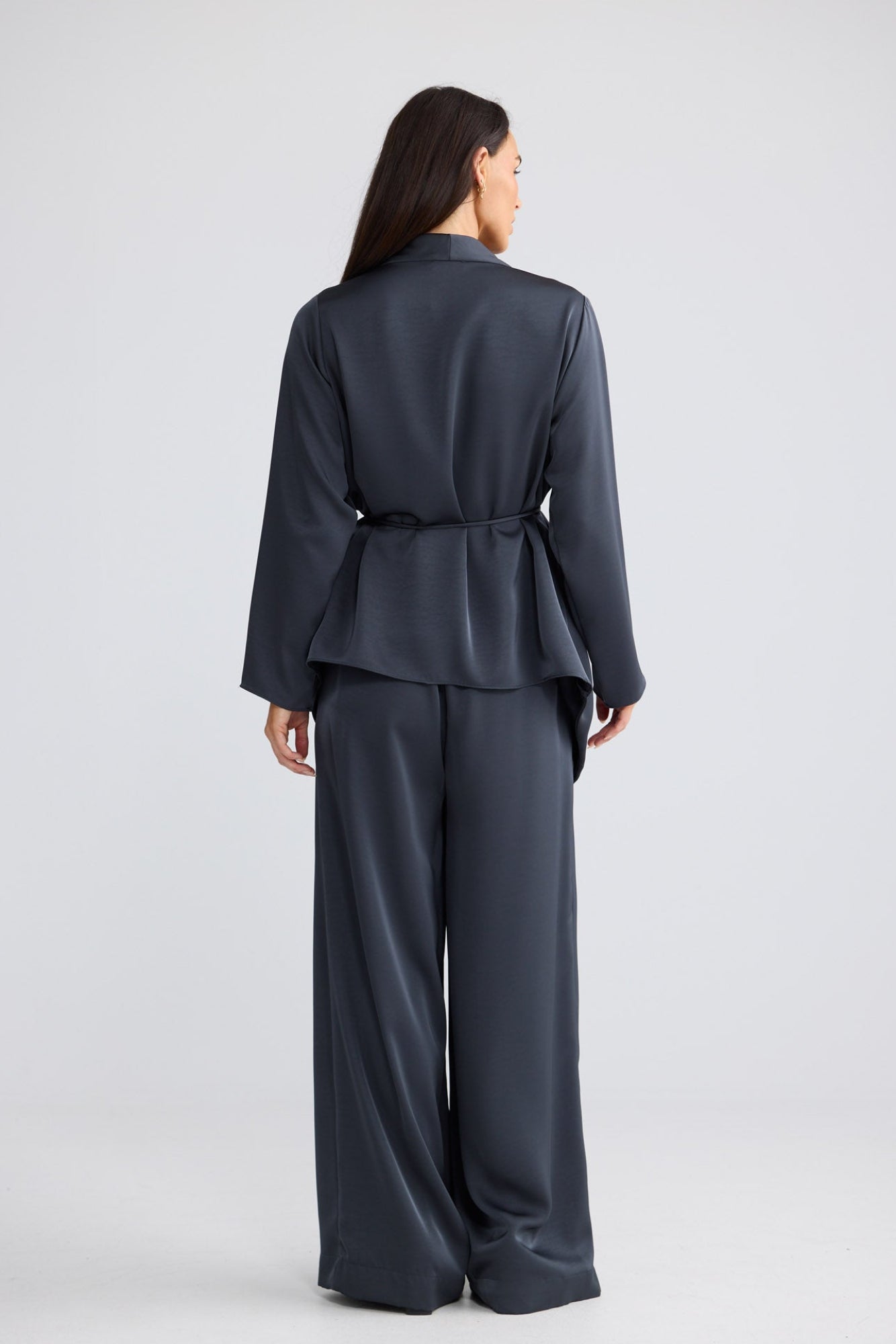 Model wearing Kaleigh Wrap Top in Graphite by Brave + True, view 6.