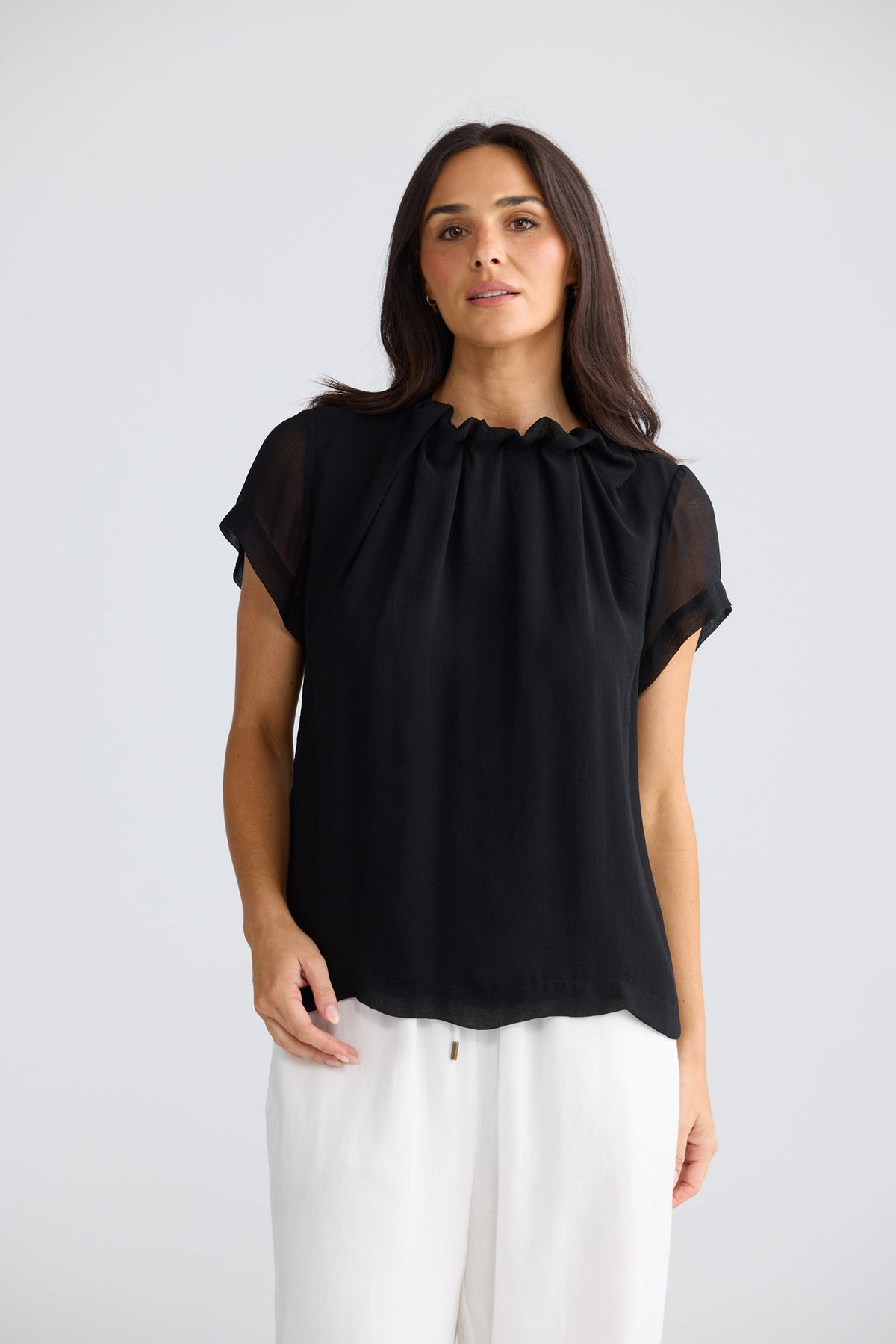 Model wearing Carina Blouse in Black by Brave + True, view 3.