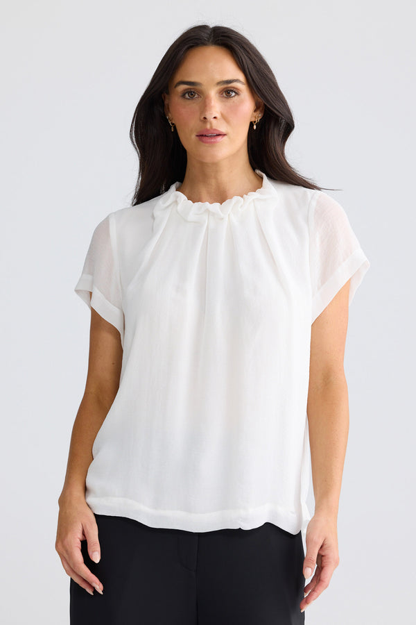 Model wearing Carina Blouse in White by Brave + True, view 2.