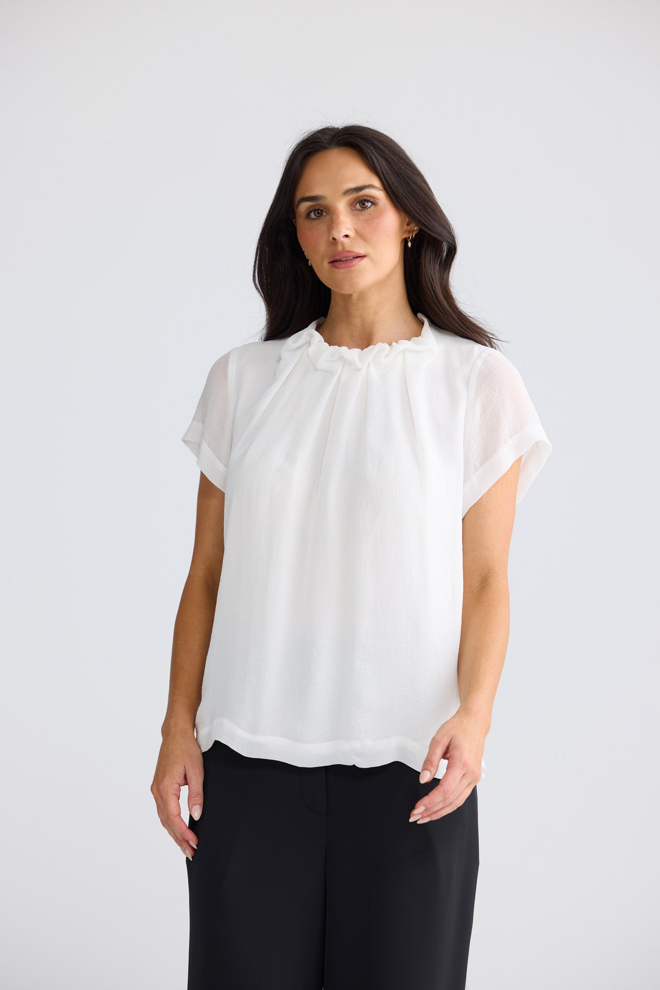 Model wearing Carina Blouse in White by Brave + True, view 3.