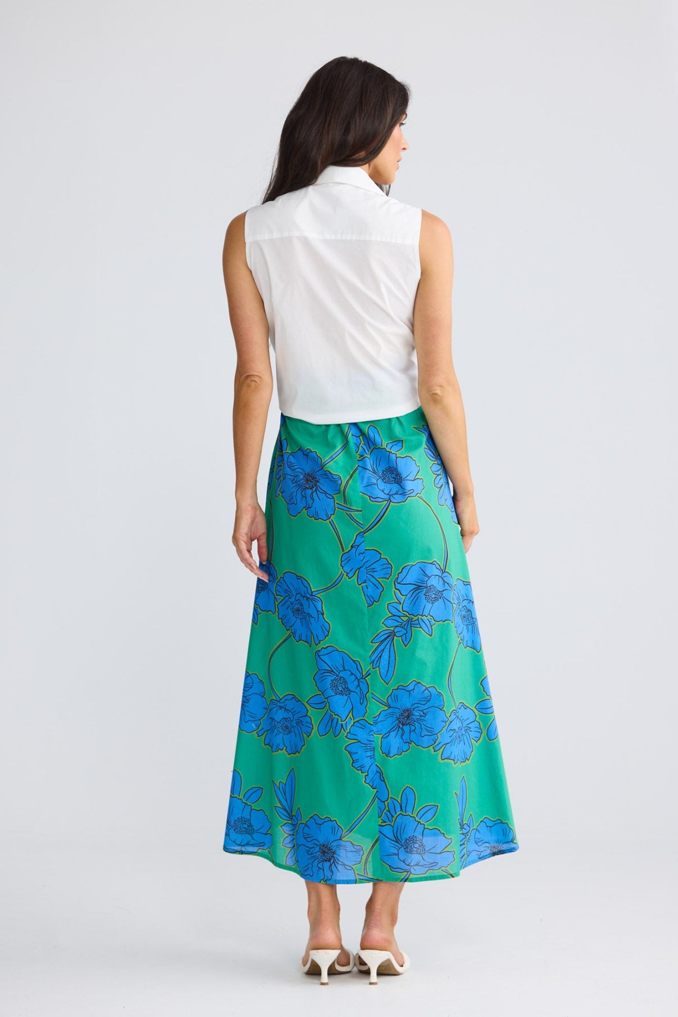 Model wearing Ovina Dress in Bloomsbury Floral print by Brave + True, front view.